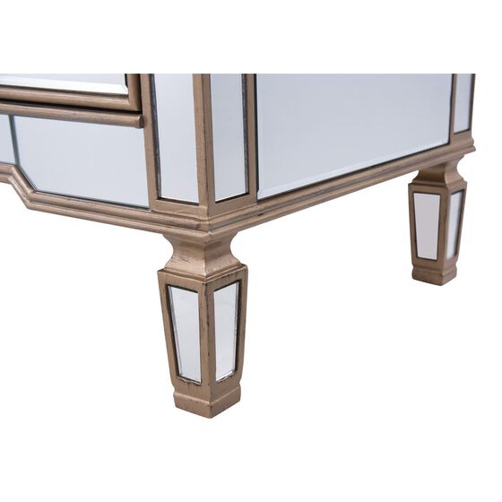 Close-up of the curved leg and frame of the storage cabinet.