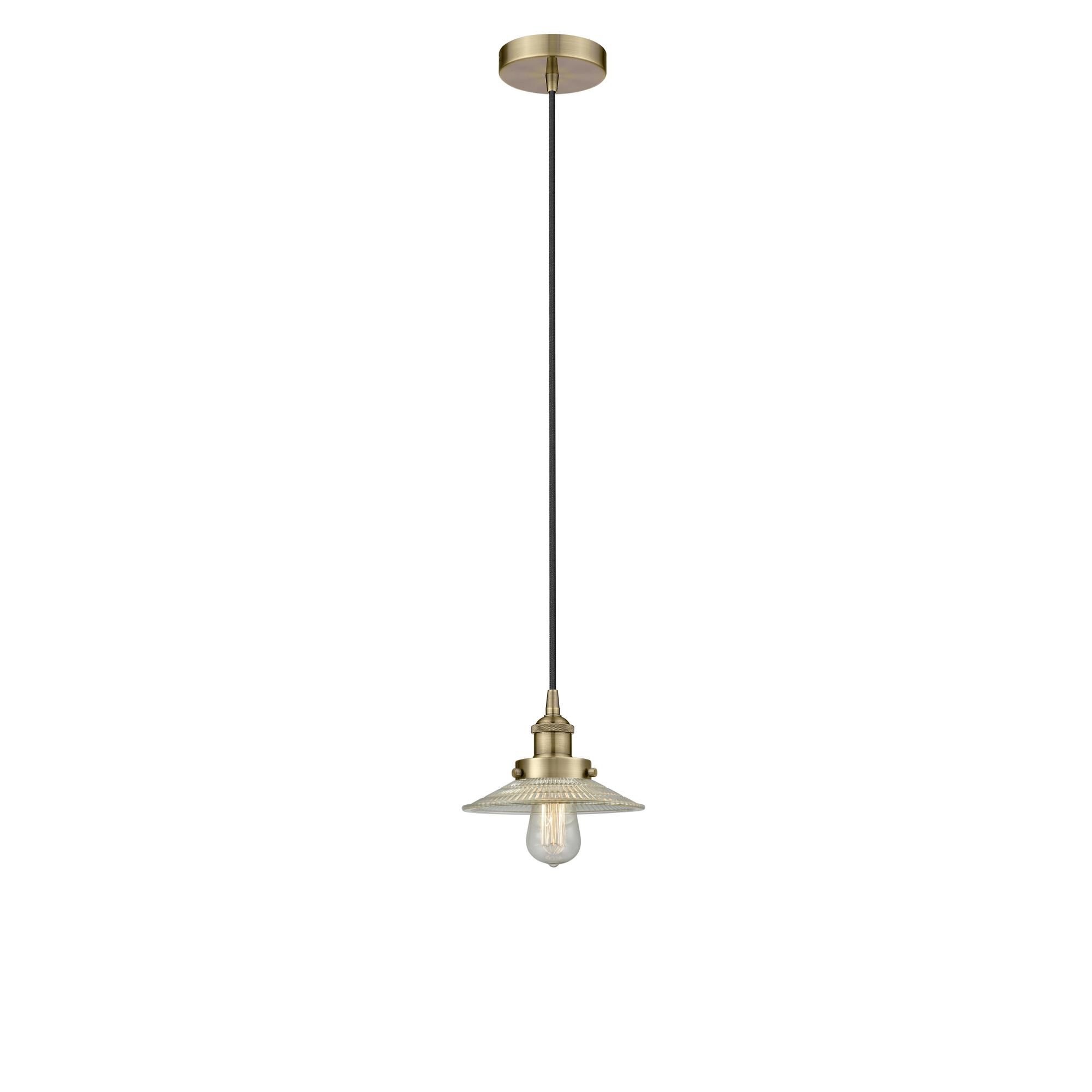 Shown in Antique Brass finish and Clear glass