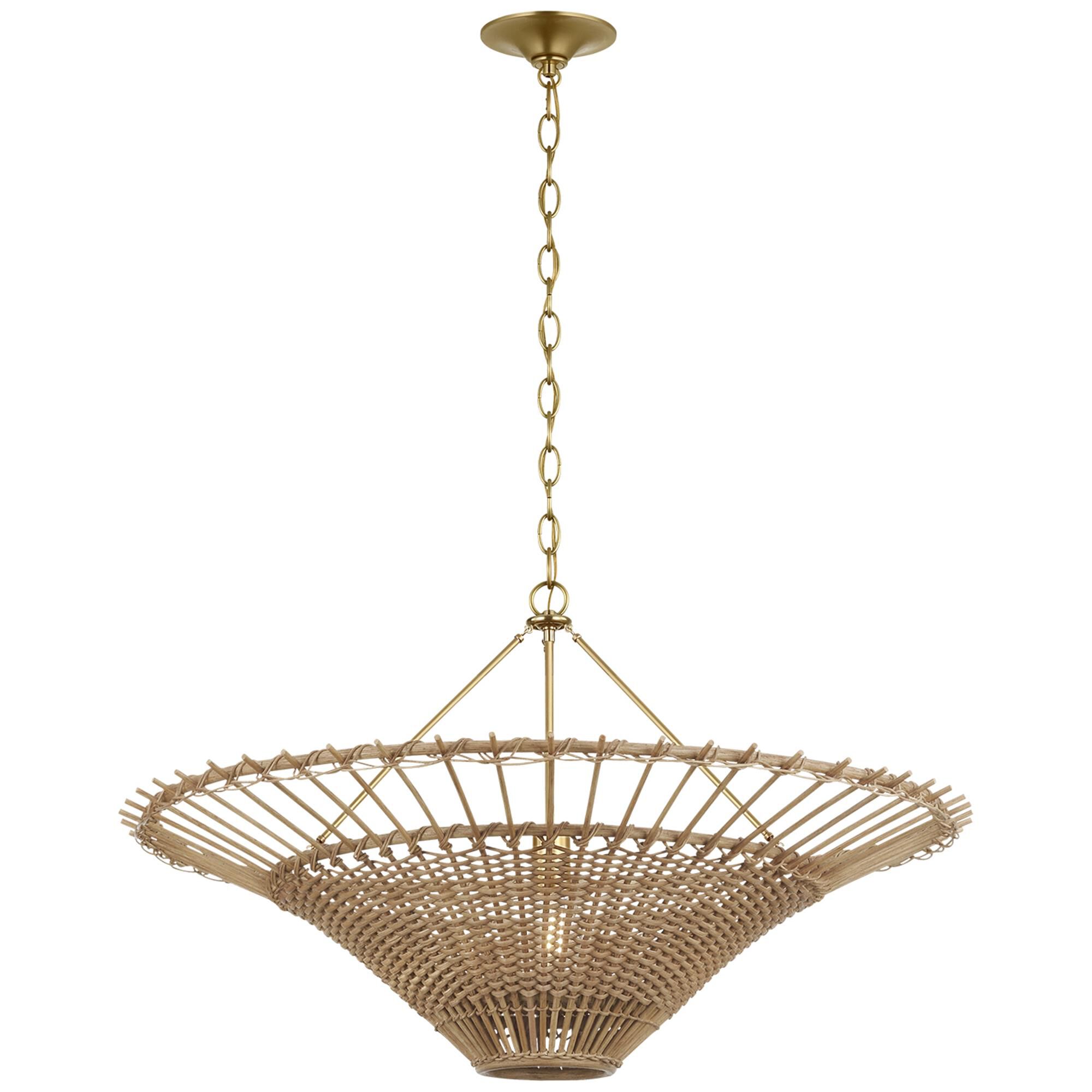 Shown in Hand-Rubbed Antique Brass finish and Natural Wicker shade