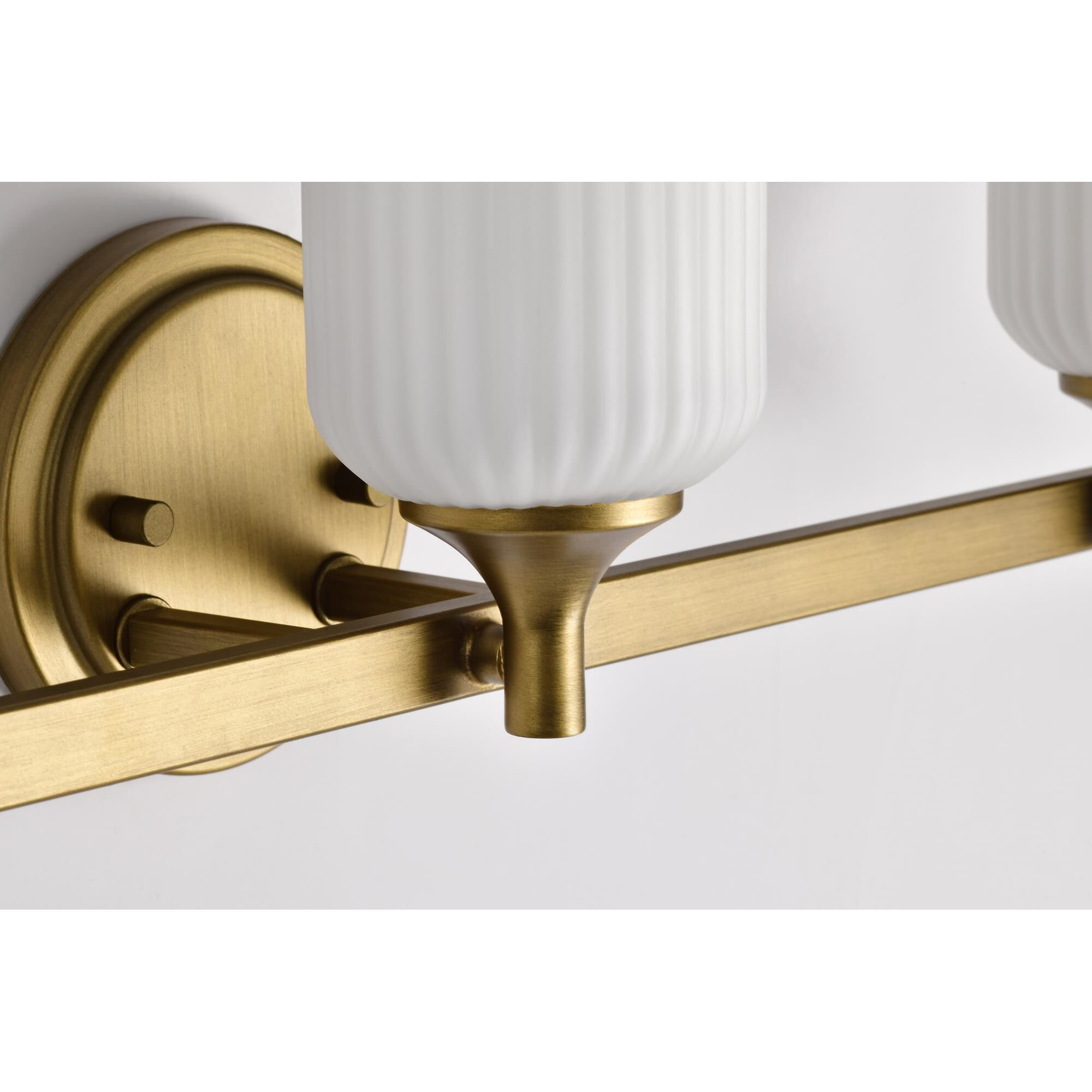 Shown in Natural Brass finish and Frosted Ribbed glass