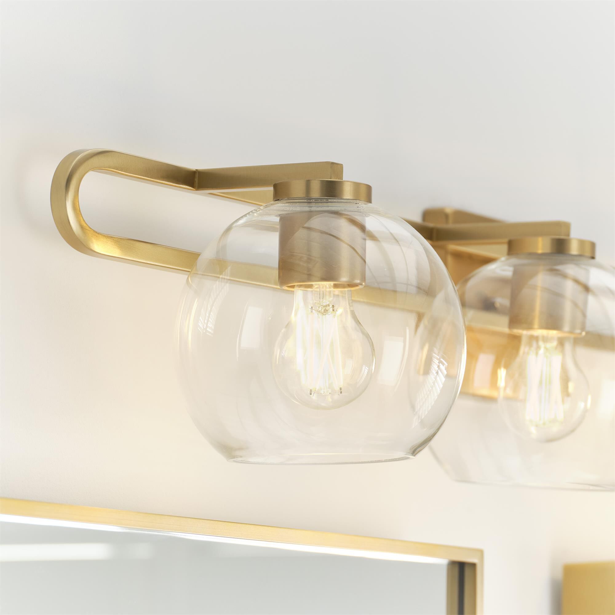 Shown in Satin Brass finish and Clear glass