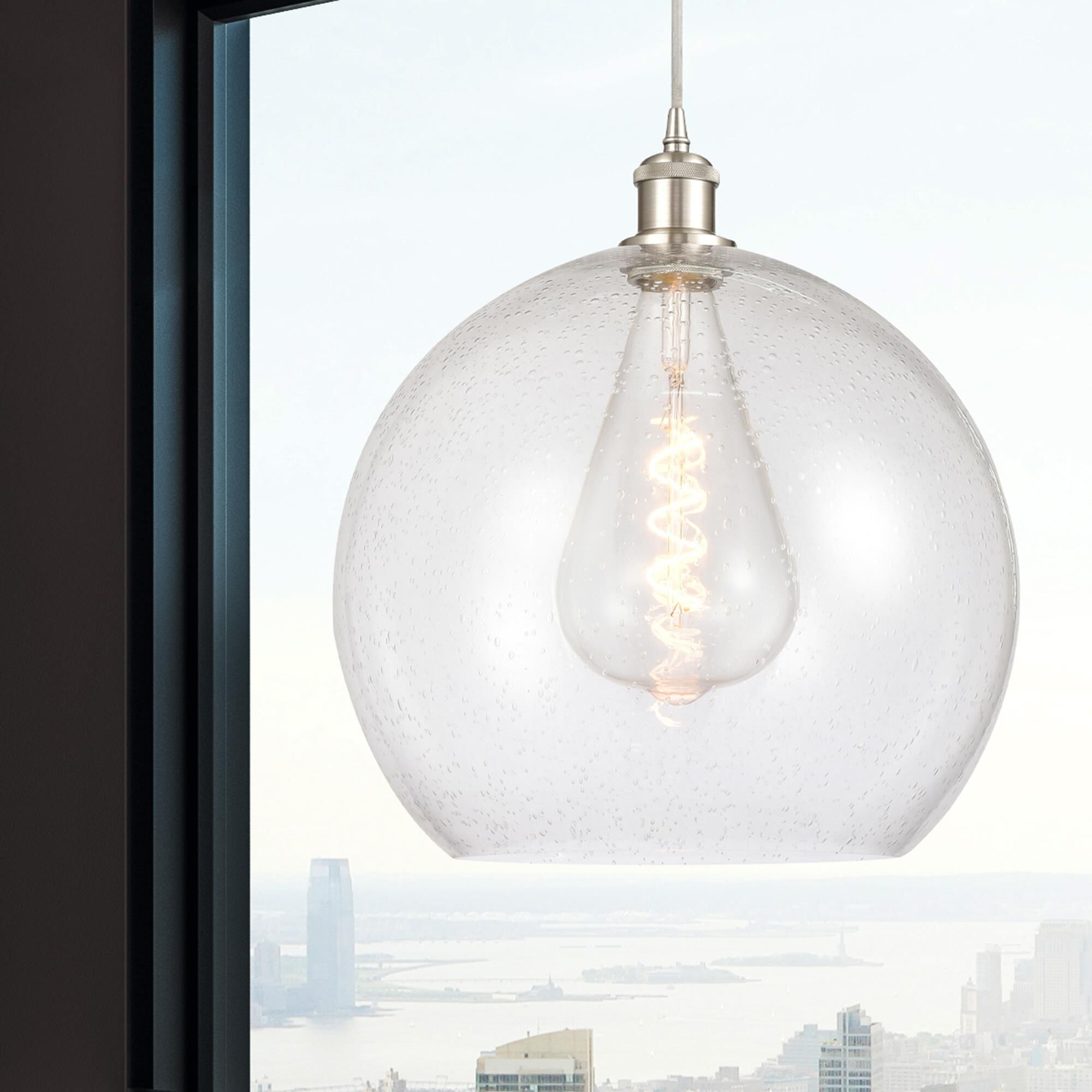 Shown in Brushed Satin Nickel finish and Seedy glass