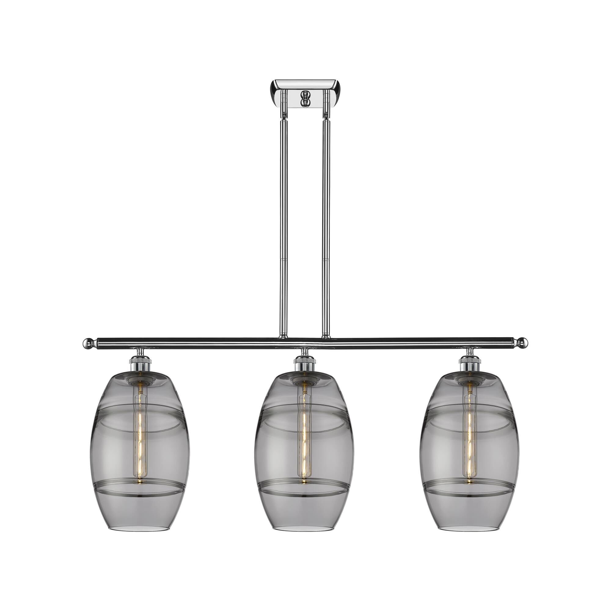 Shown in Polished Chrome finish and Light Smoke glass