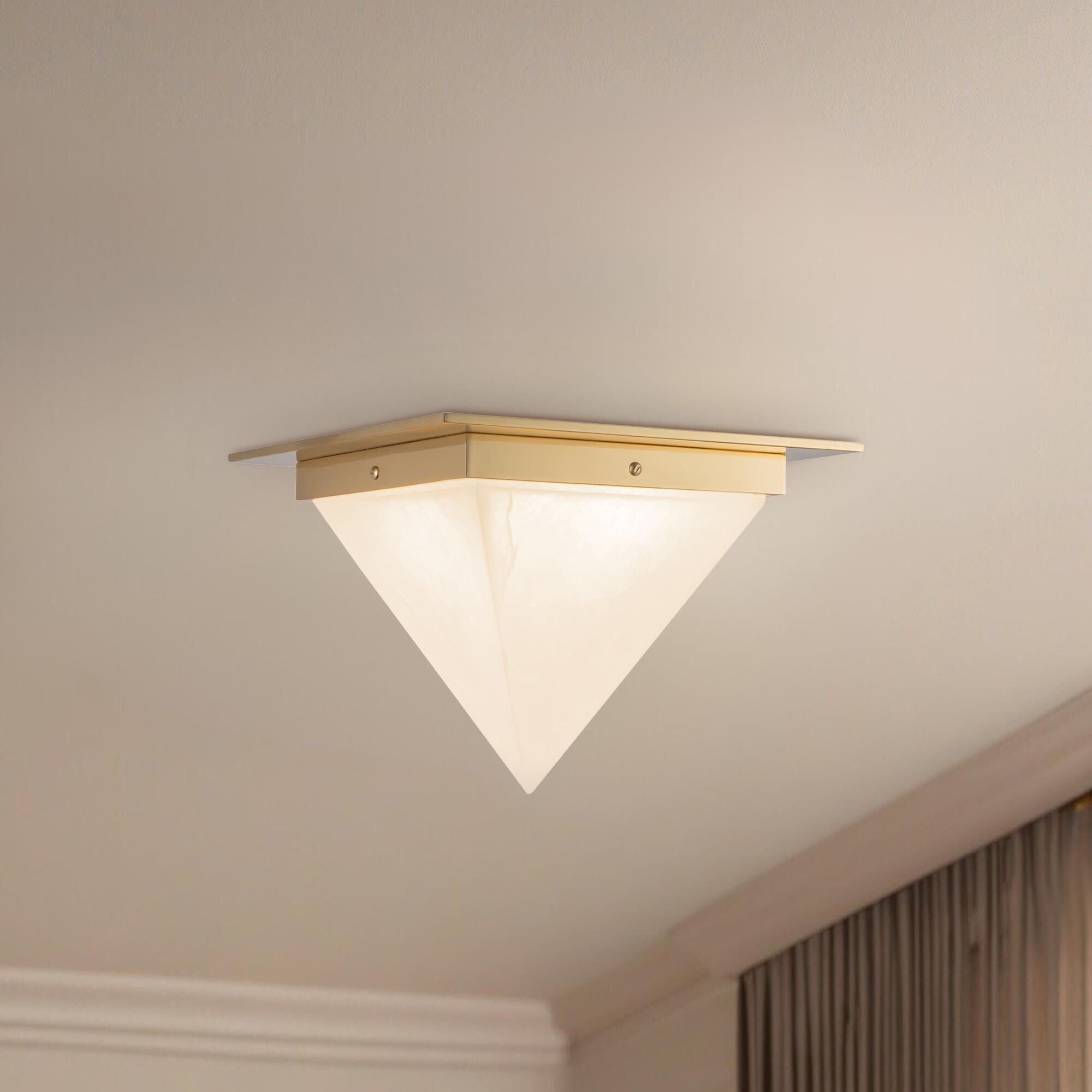 Shown in Patina Brass finish and Alabaster glass