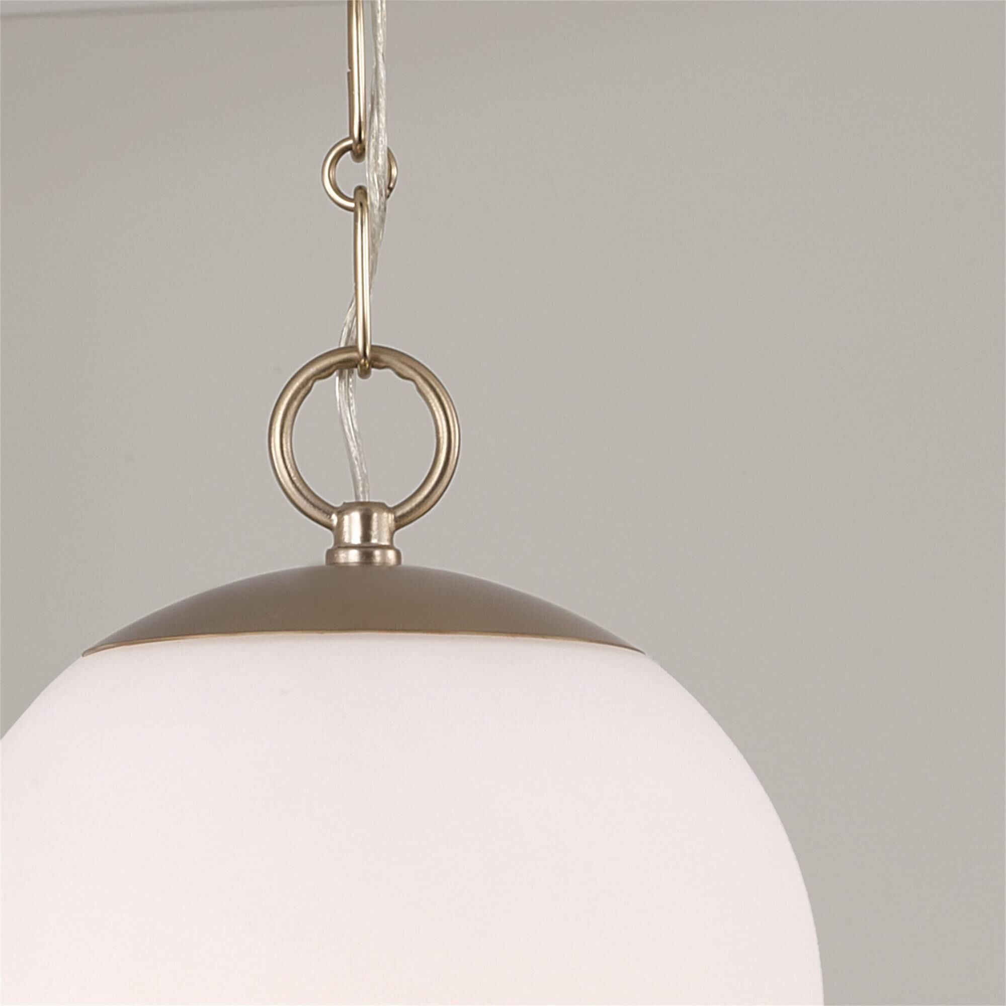 Shown in Matte Brass finish and Faux Alabaster glass