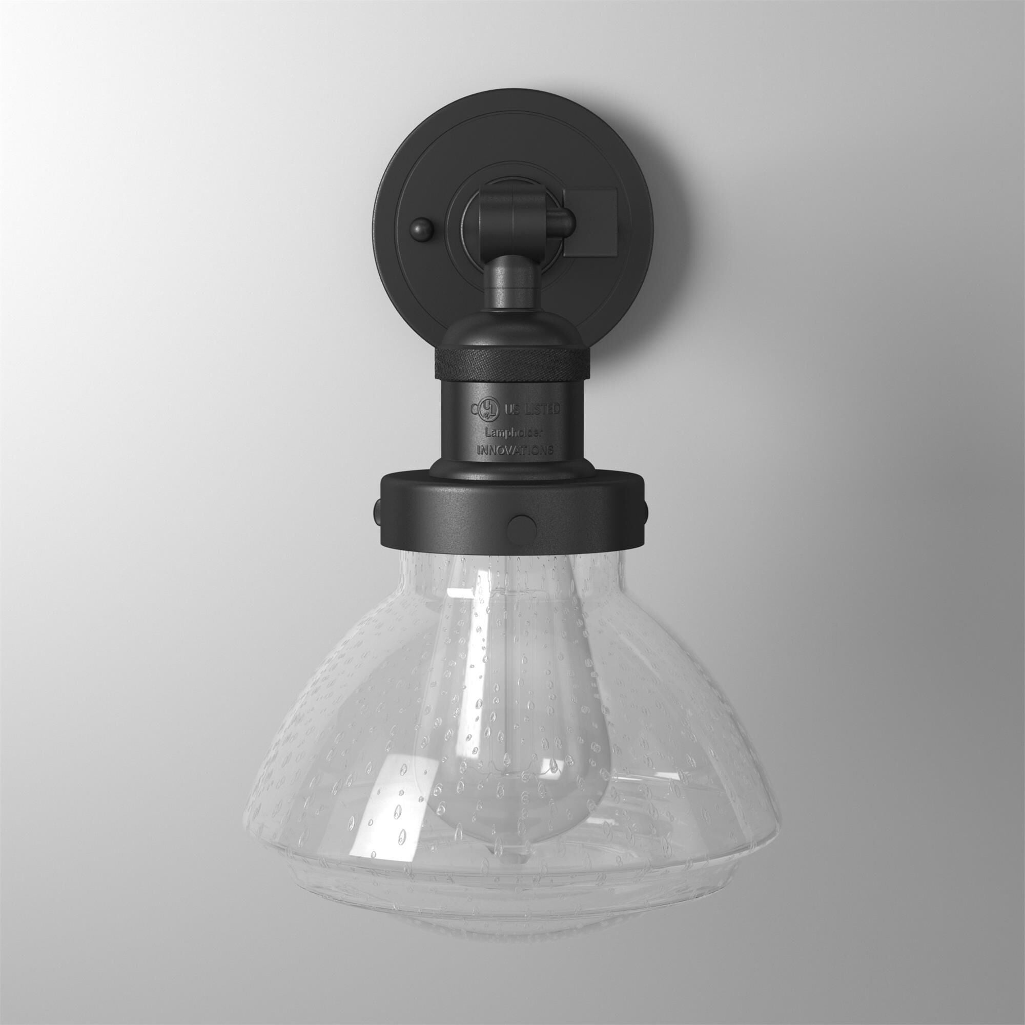 Shown in Matte Black finish and Seeded Seedy Olean glass and Glass shade and Bulb Tint - Amber accent