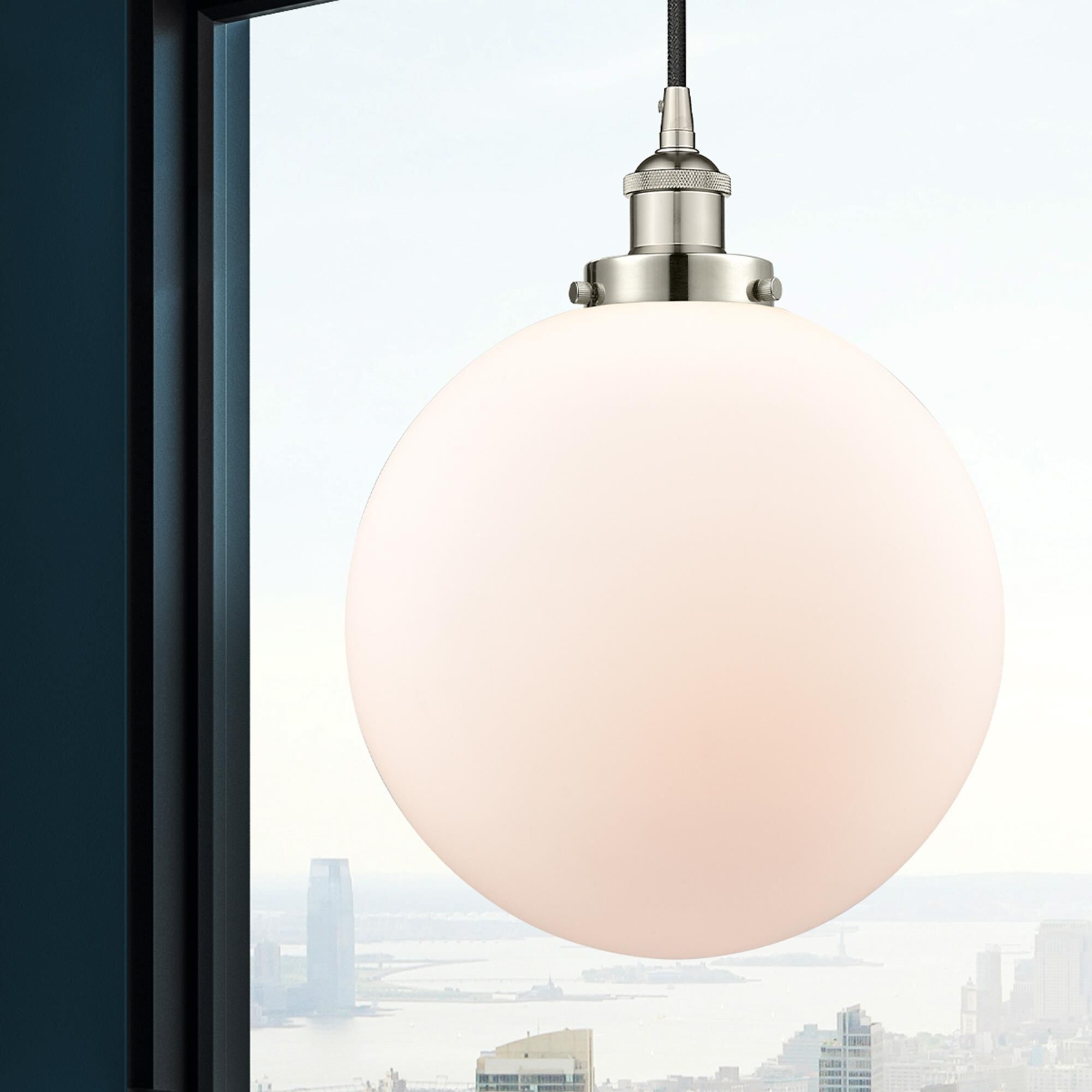 Shown in Polished Nickel finish and Matte White Cased Beacon glass