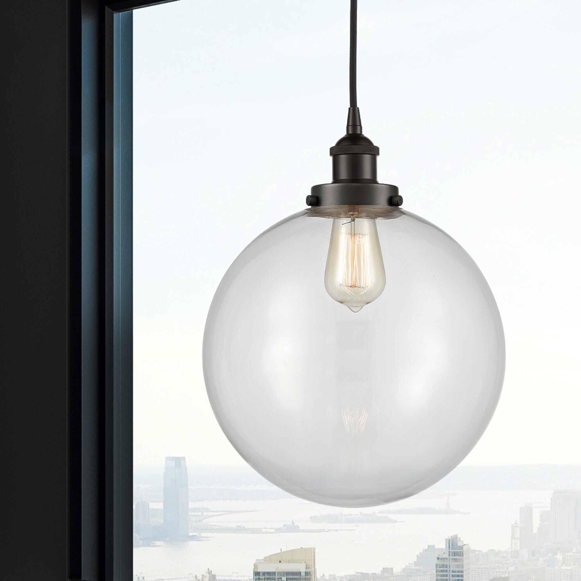 Shown in Oil Rubbed Bronze finish and Clear Beacon glass
