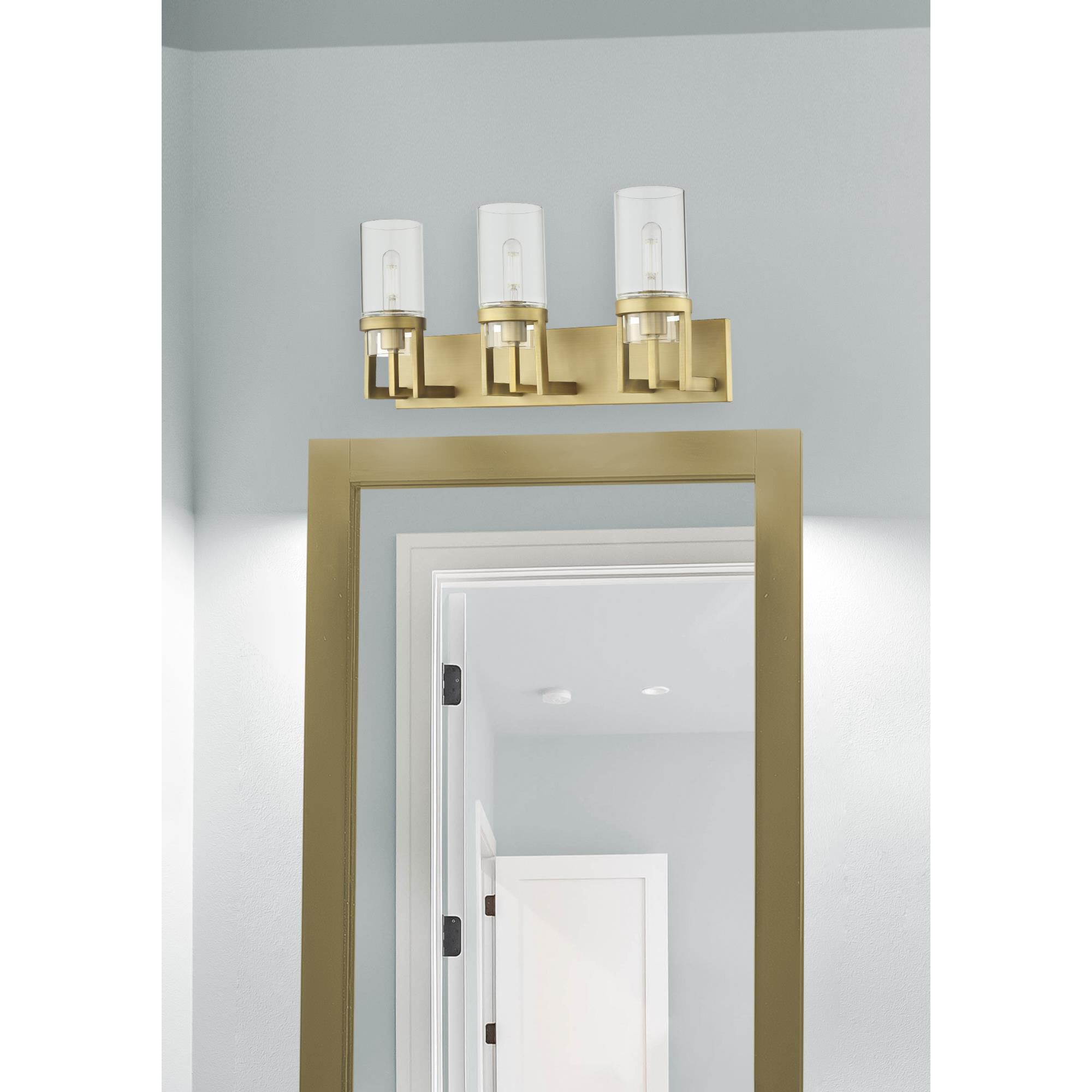 Shown in Brushed Brass finish and Clear glass