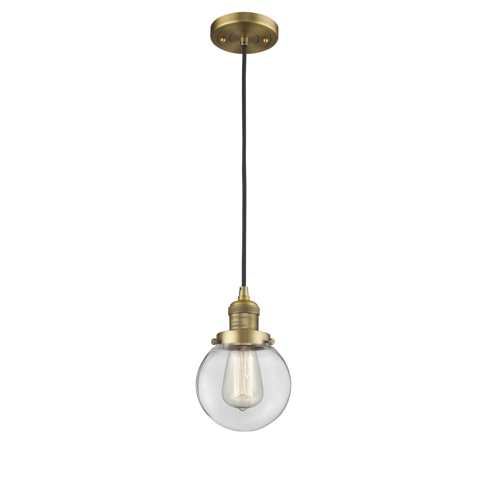 Shown in Brushed Brass finish and Clear glass