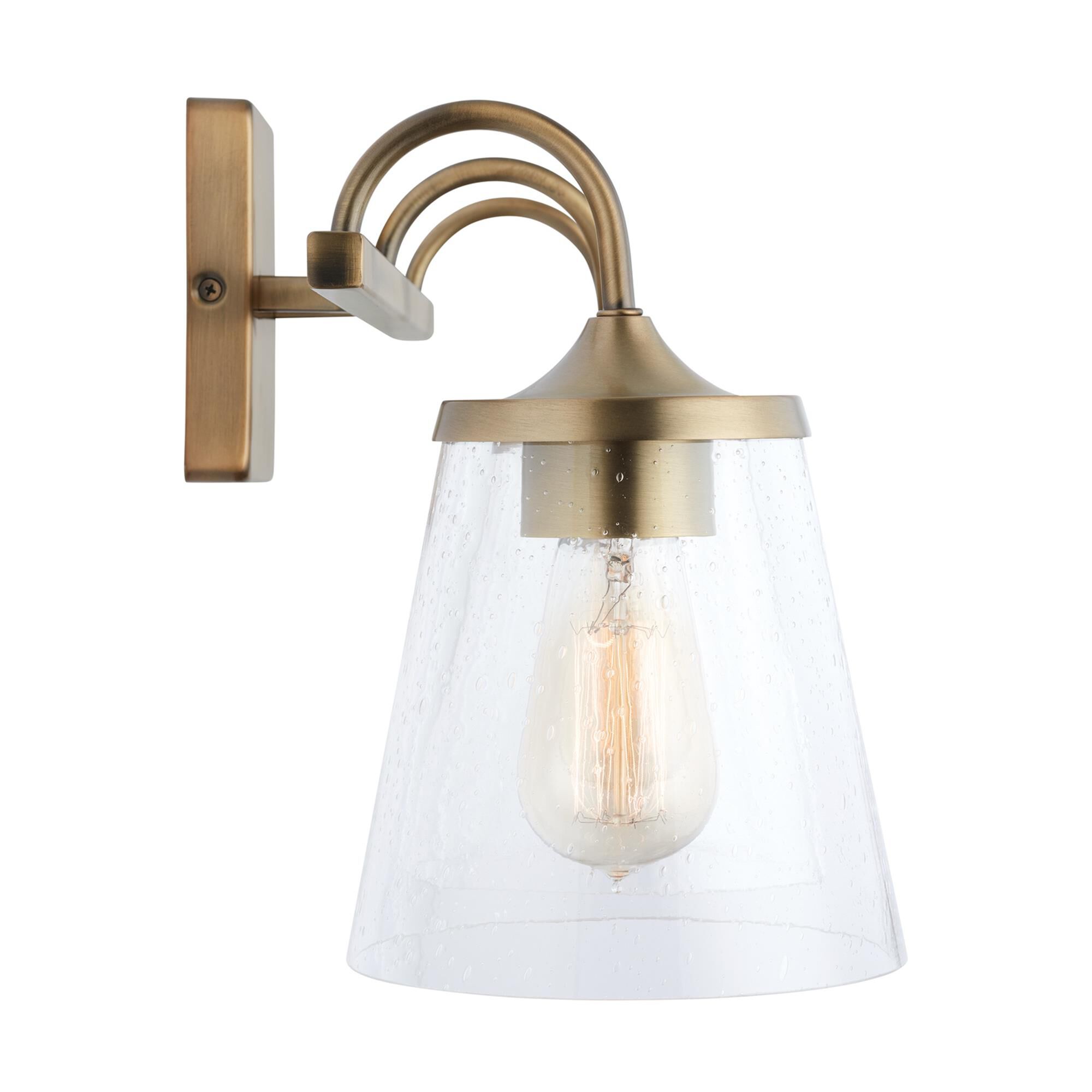 Shown in Aged Brass finish and Clear Seeded glass