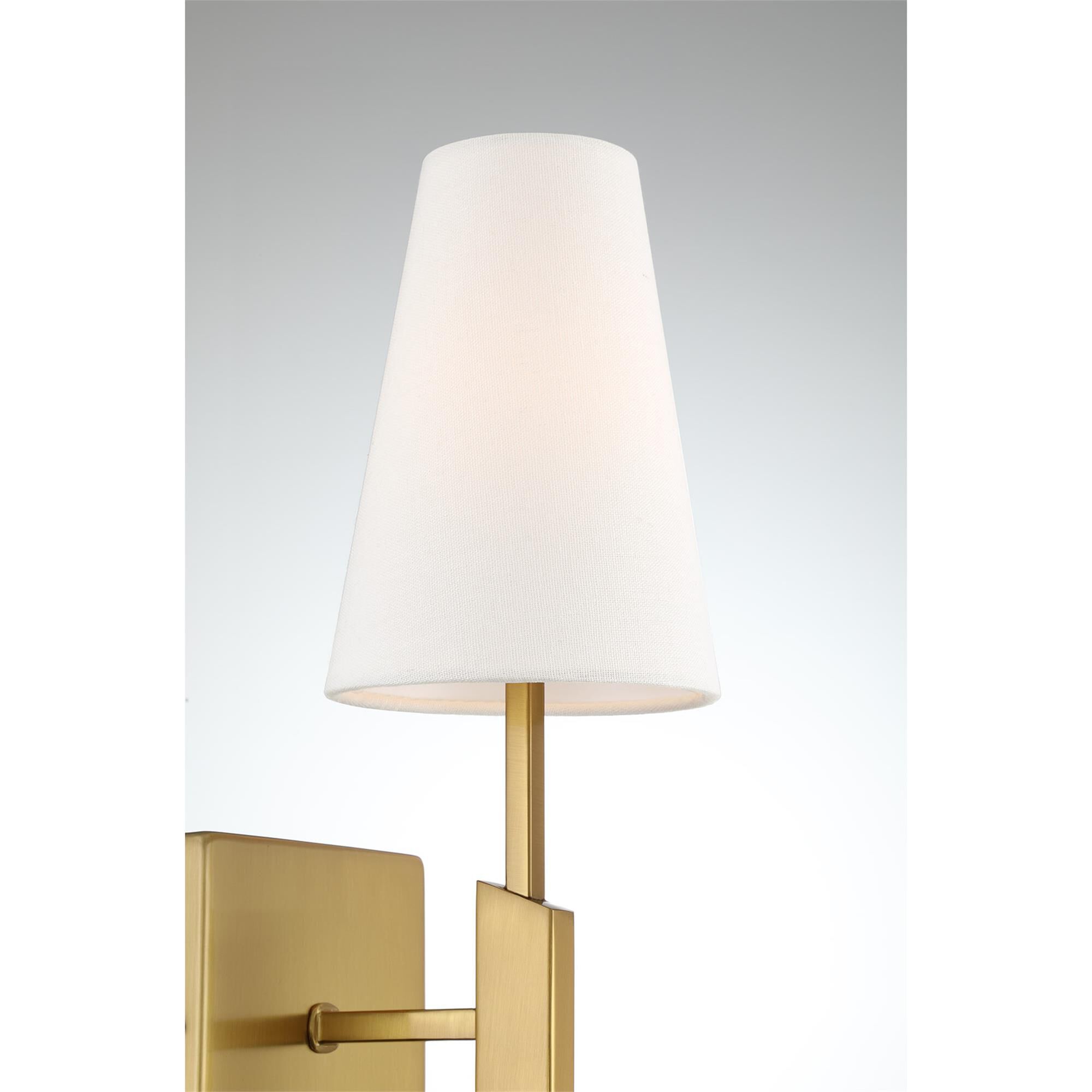 Shown in Natural Brass finish and White Linen Fabric shade