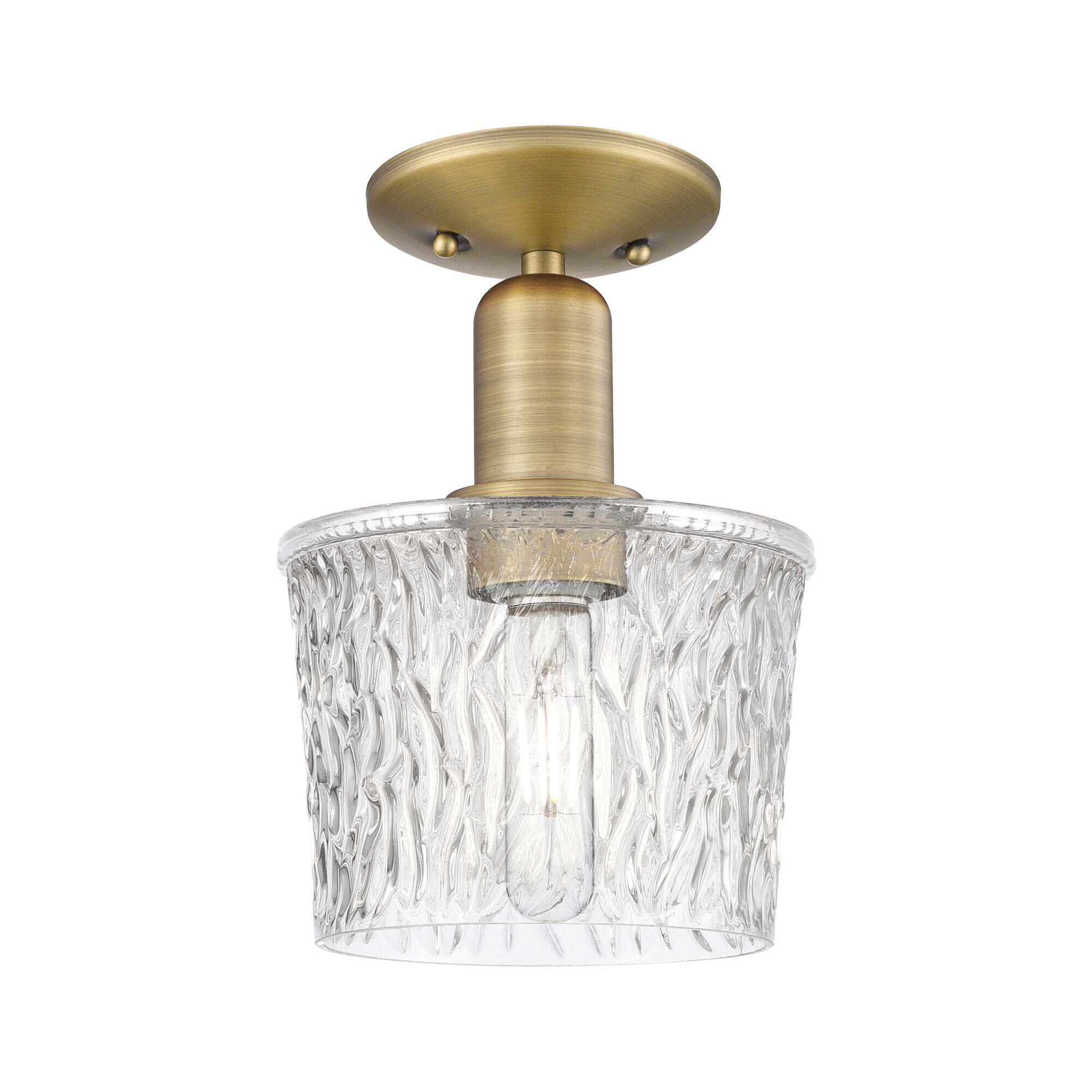 Shown in Brushed Brass finish and Clear glass