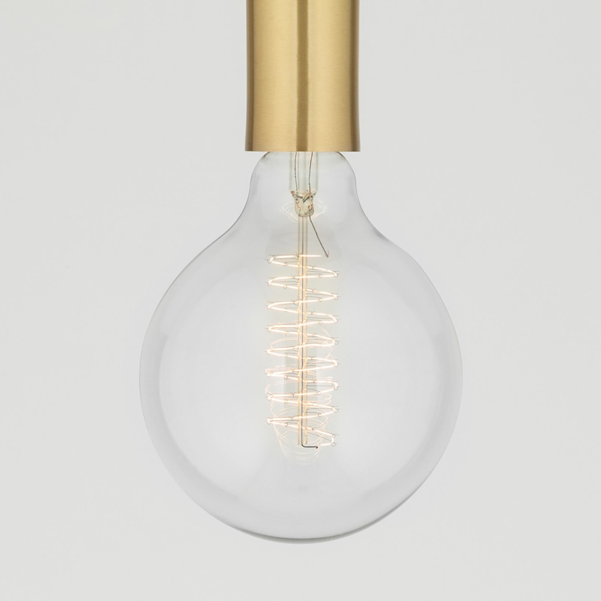 Shown in Aged Brass finish and Clear glass