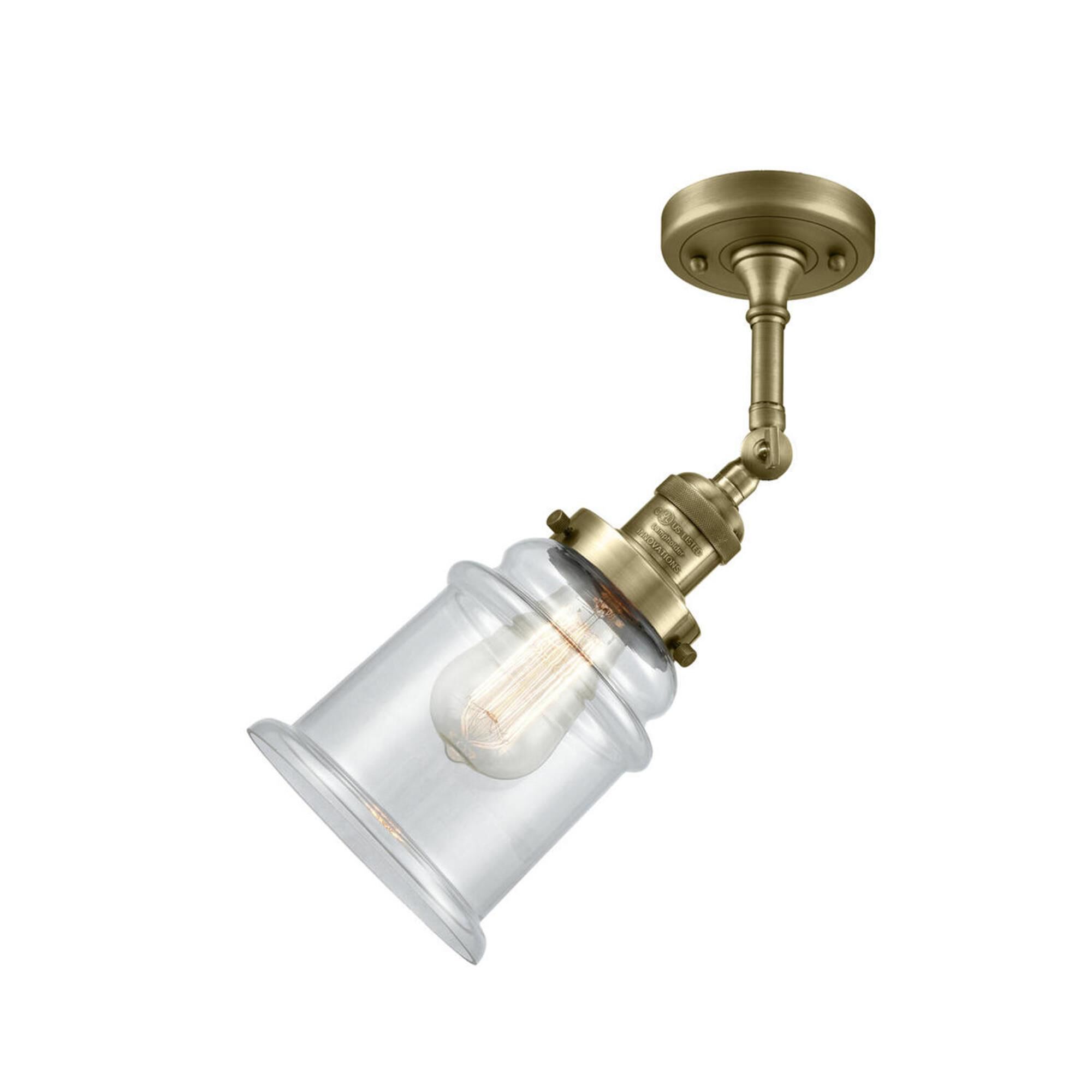 Shown in Antique Brass finish and Clear glass and None accent