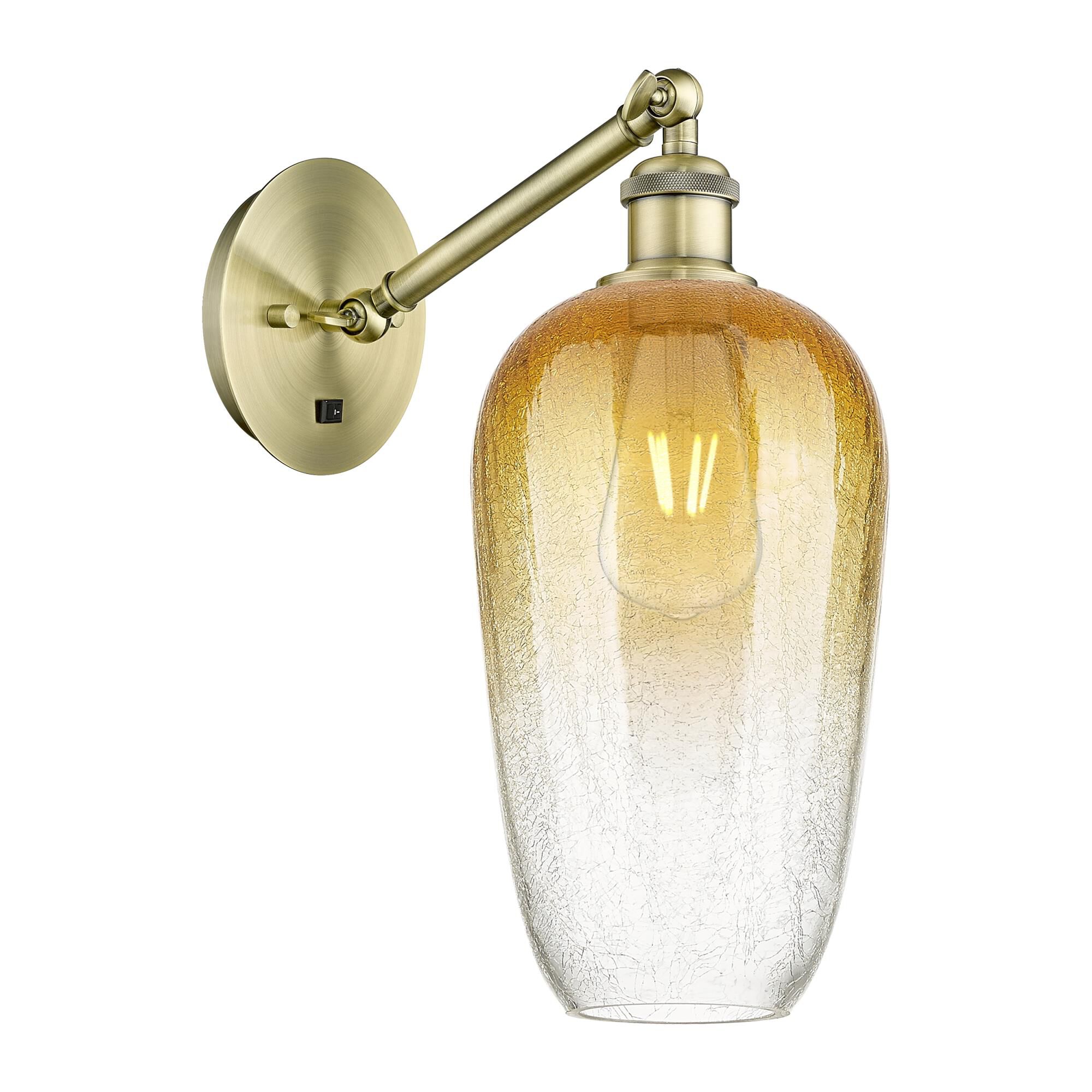 Shown in Antique Brass finish and Amber glass