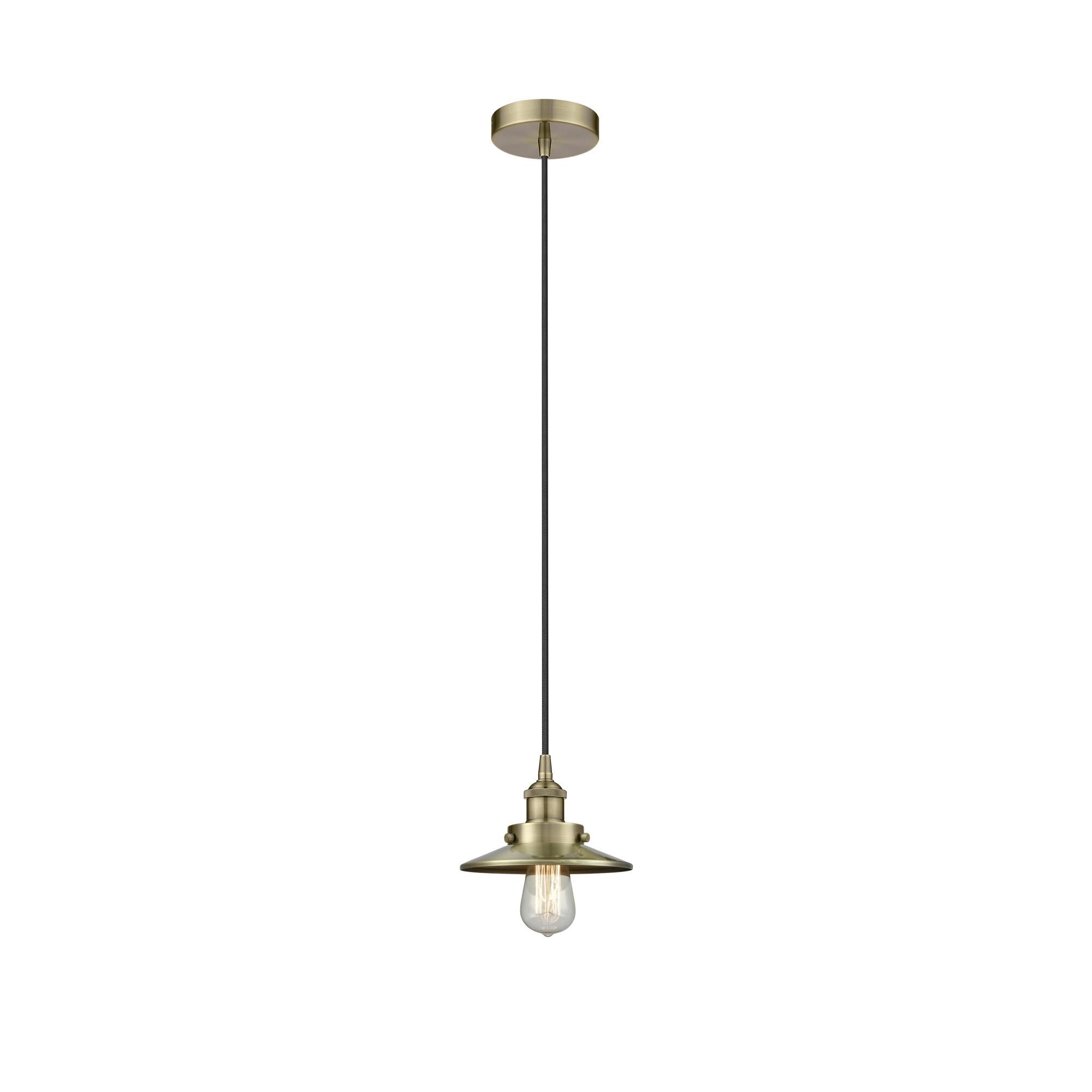 Shown in Antique Brass finish and Antique Brass shade