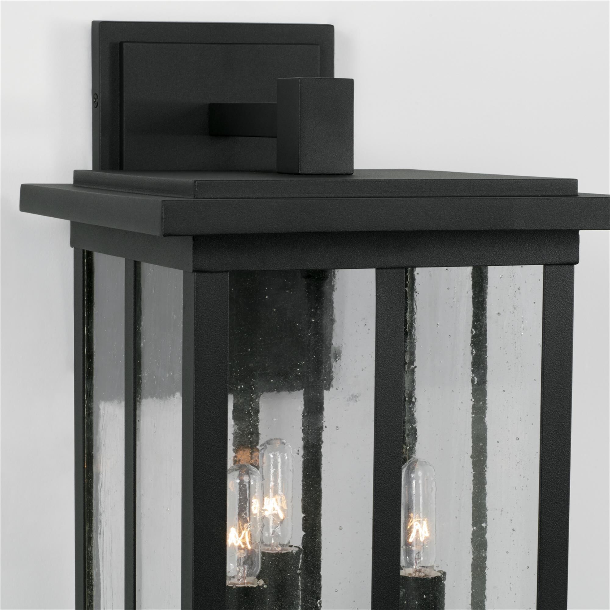 Shown in Black finish and Antiqued glass