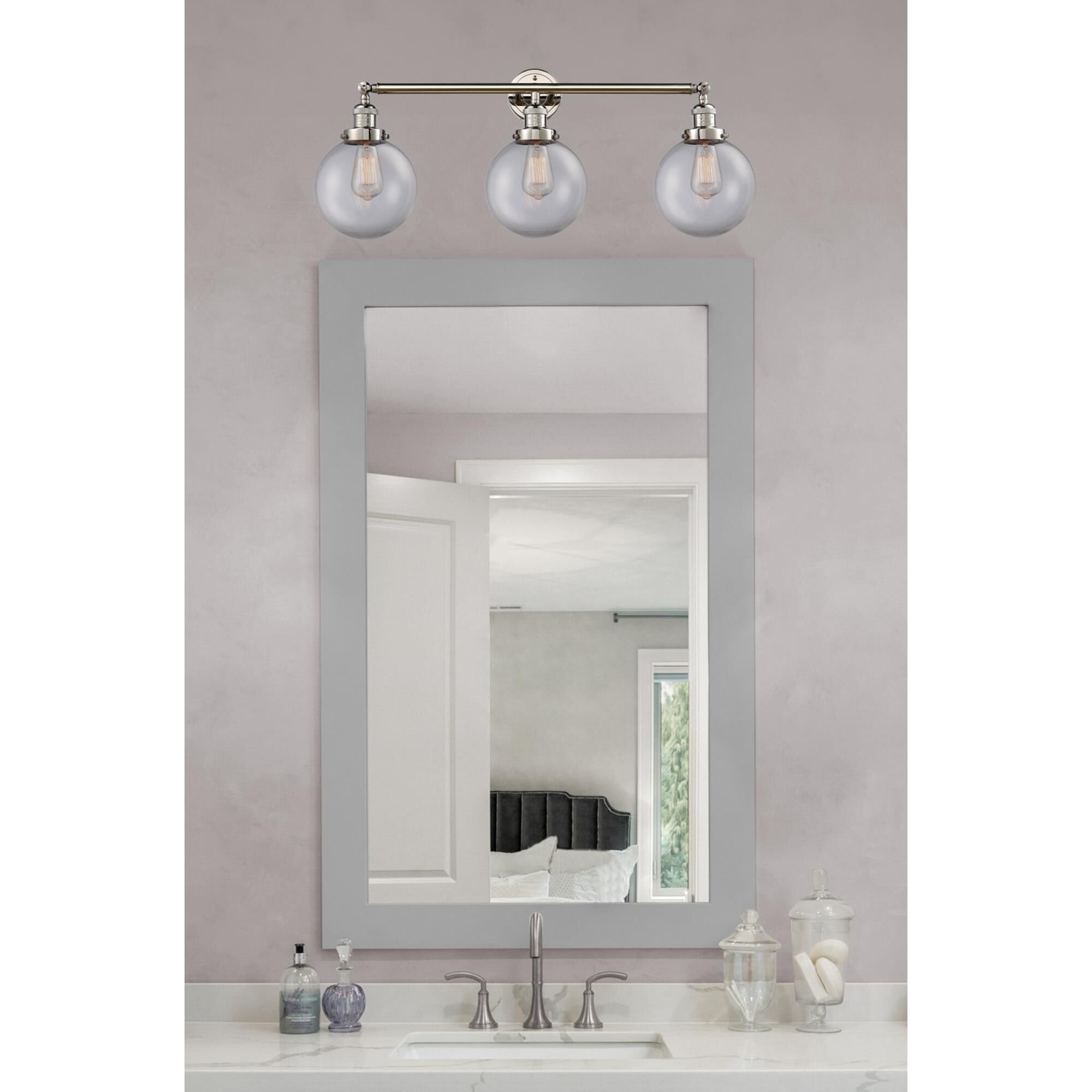 Shown in Polished Nickel finish and Clear Beacon glass