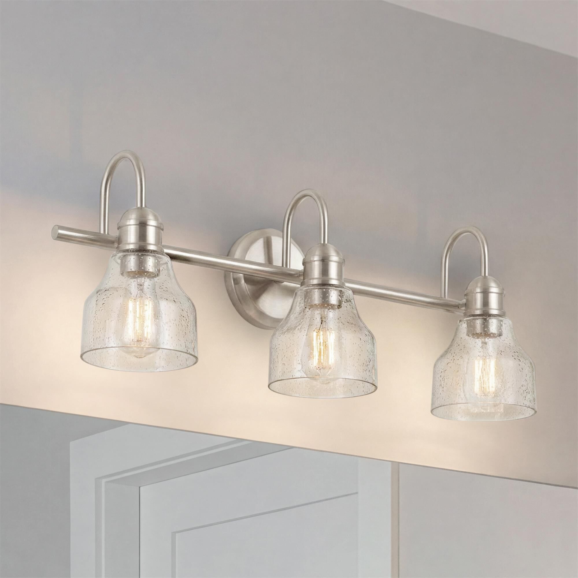 Shown in Brushed Nickel finish and Clear Seeded glass