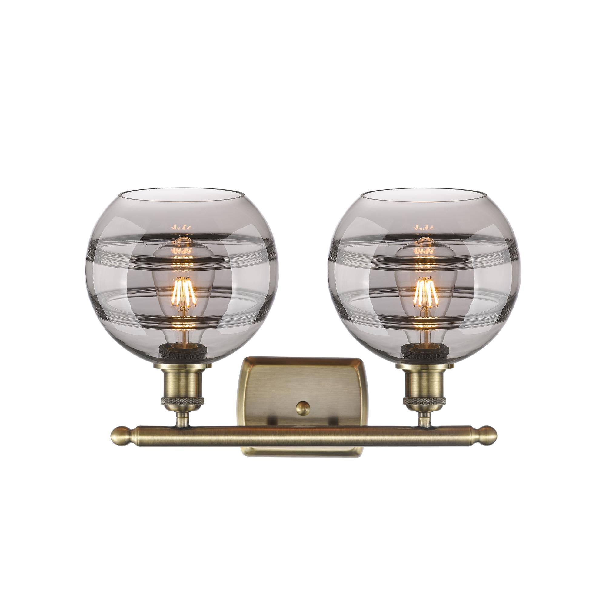 Shown in Antique Brass finish and Light Smoke glass