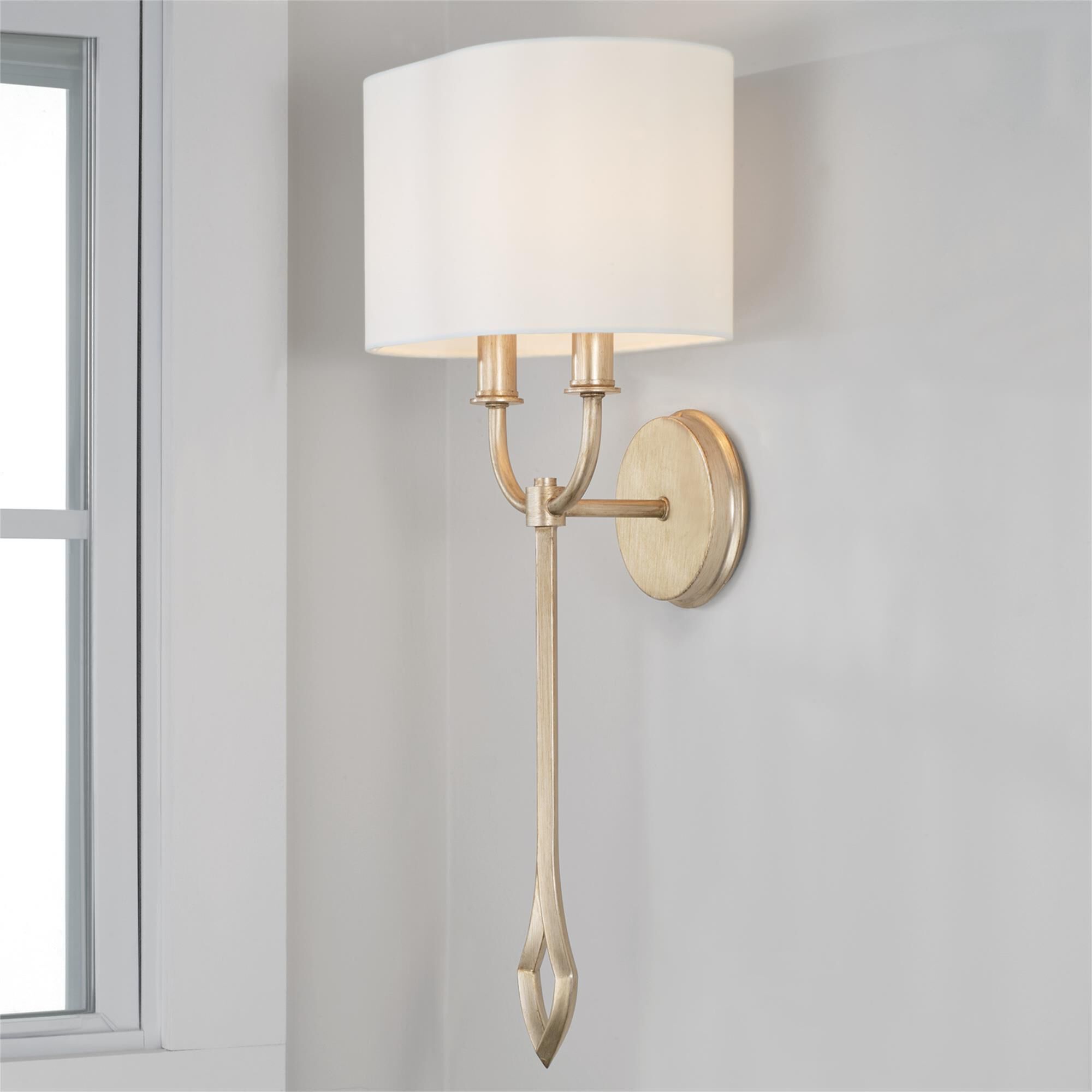 Shown in Brushed Champagne finish and White Fabric Oval Stay-Straight shade