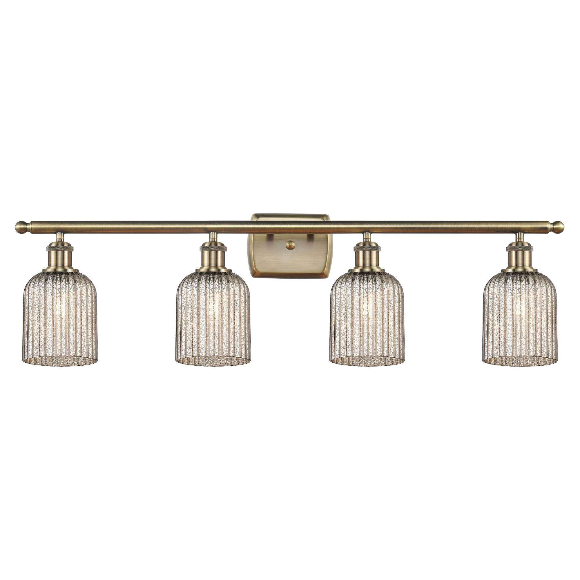 Shown in Antique Brass finish and Mercury shade