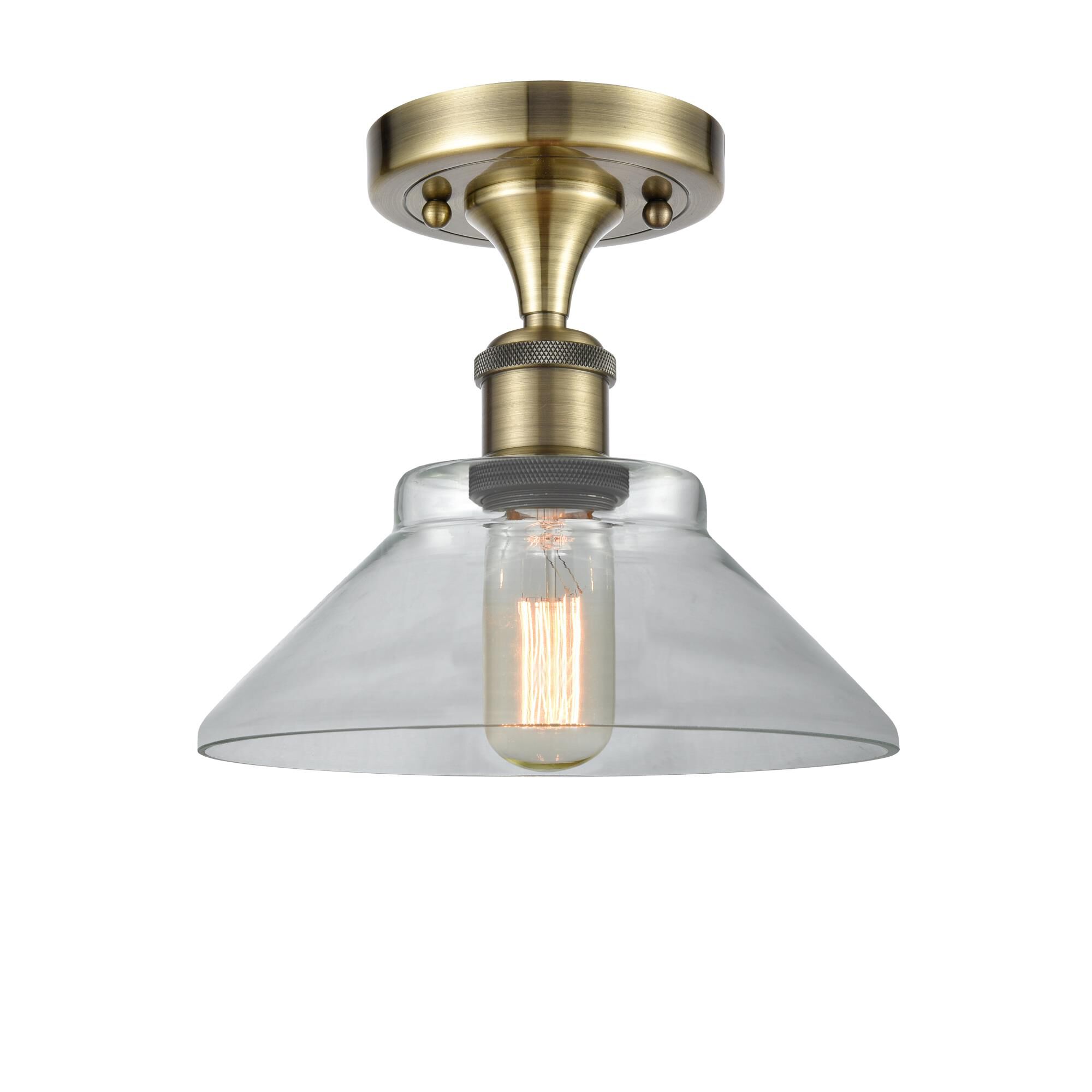 Shown in Antique Brass finish and Disc glass and Glass shade