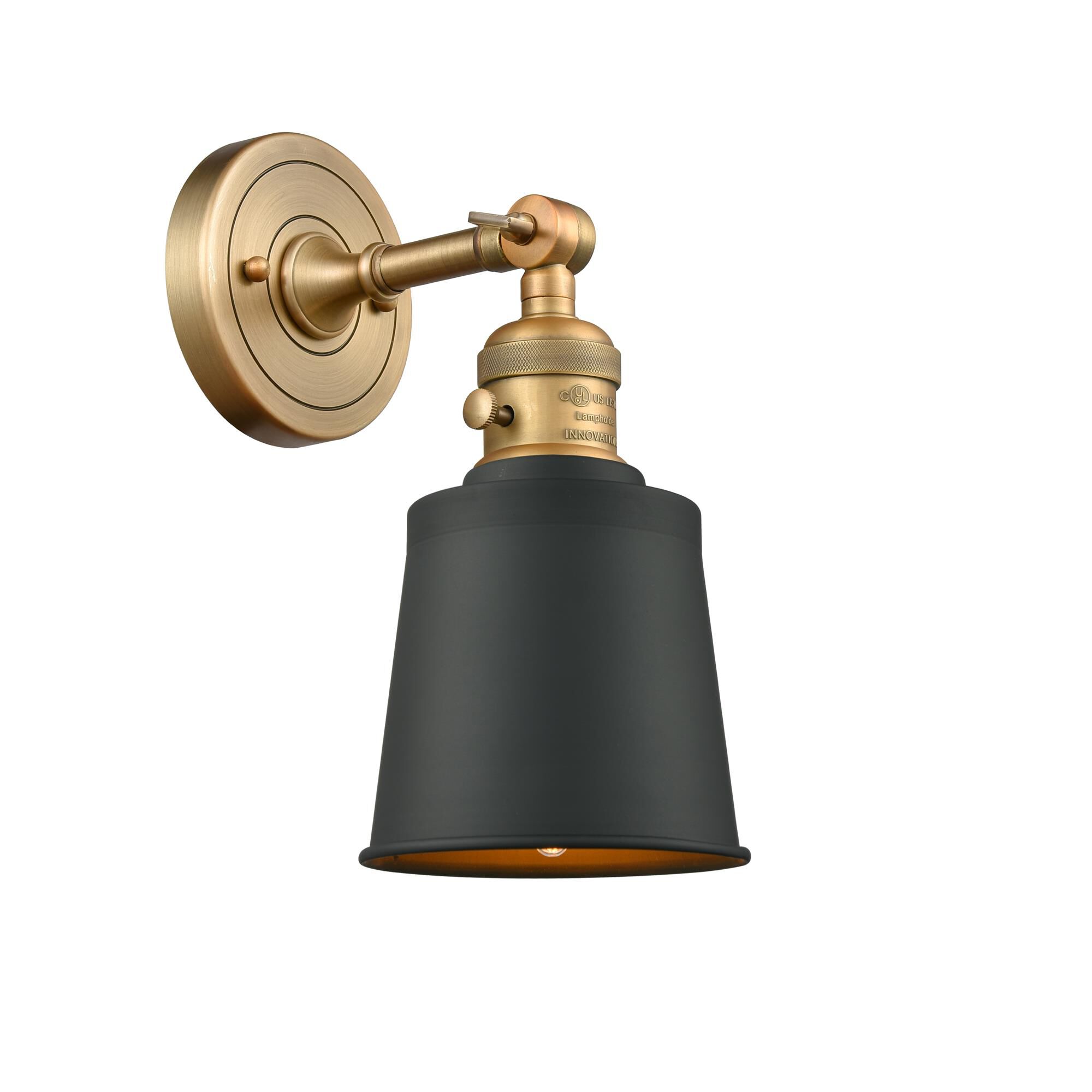 Shown in Brushed Brass finish and Brushed Brass Addison shade