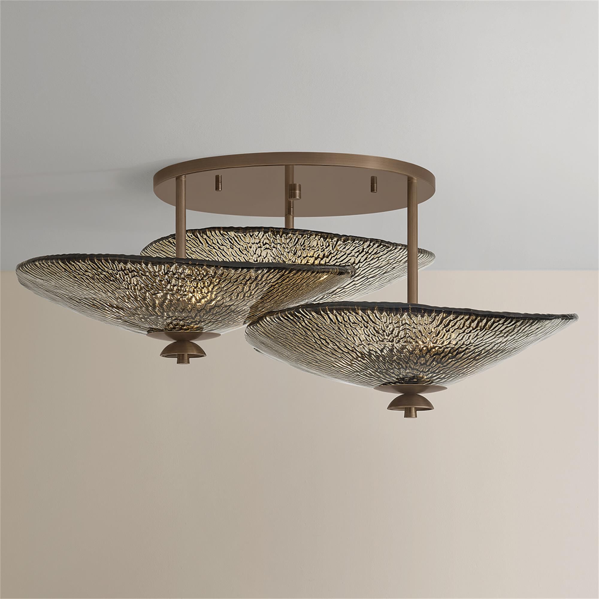 Shown in Old World Brass finish and Bronze glass