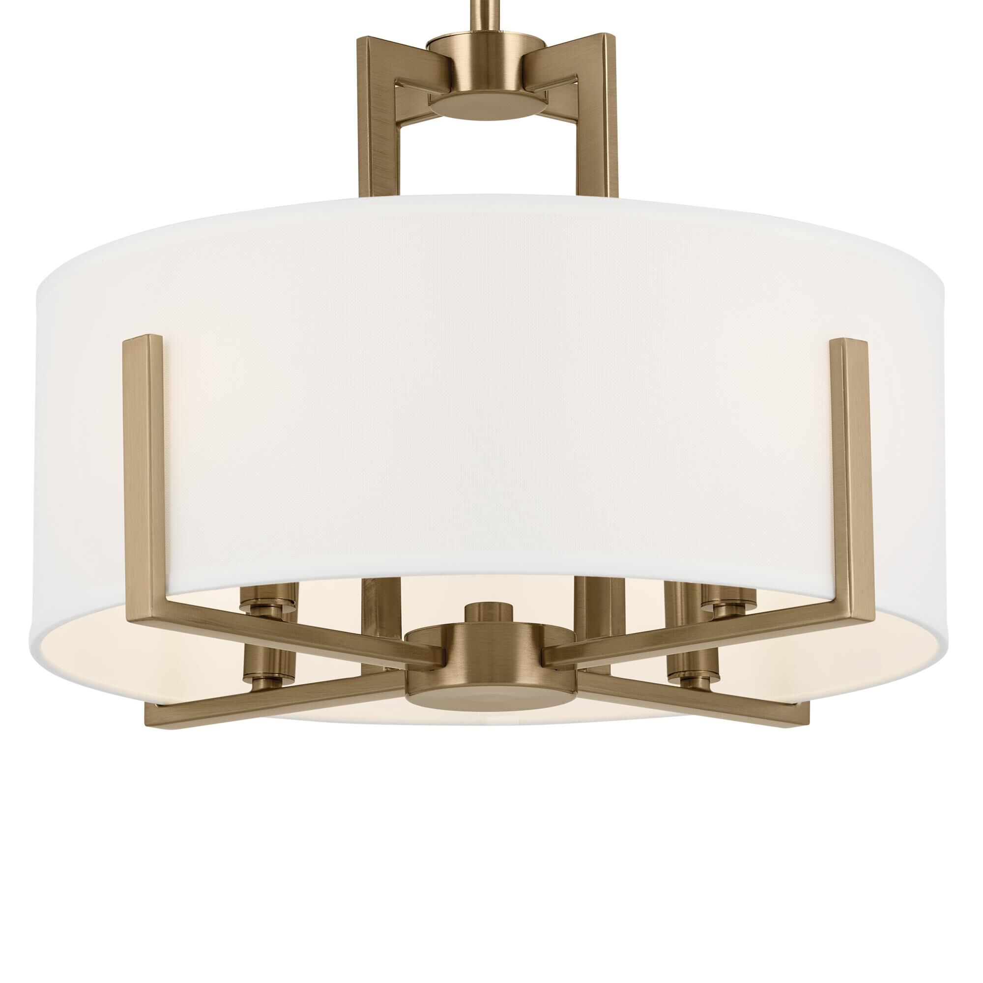 Shown in Champagne Bronze finish and Fabric and Drum Linen shade