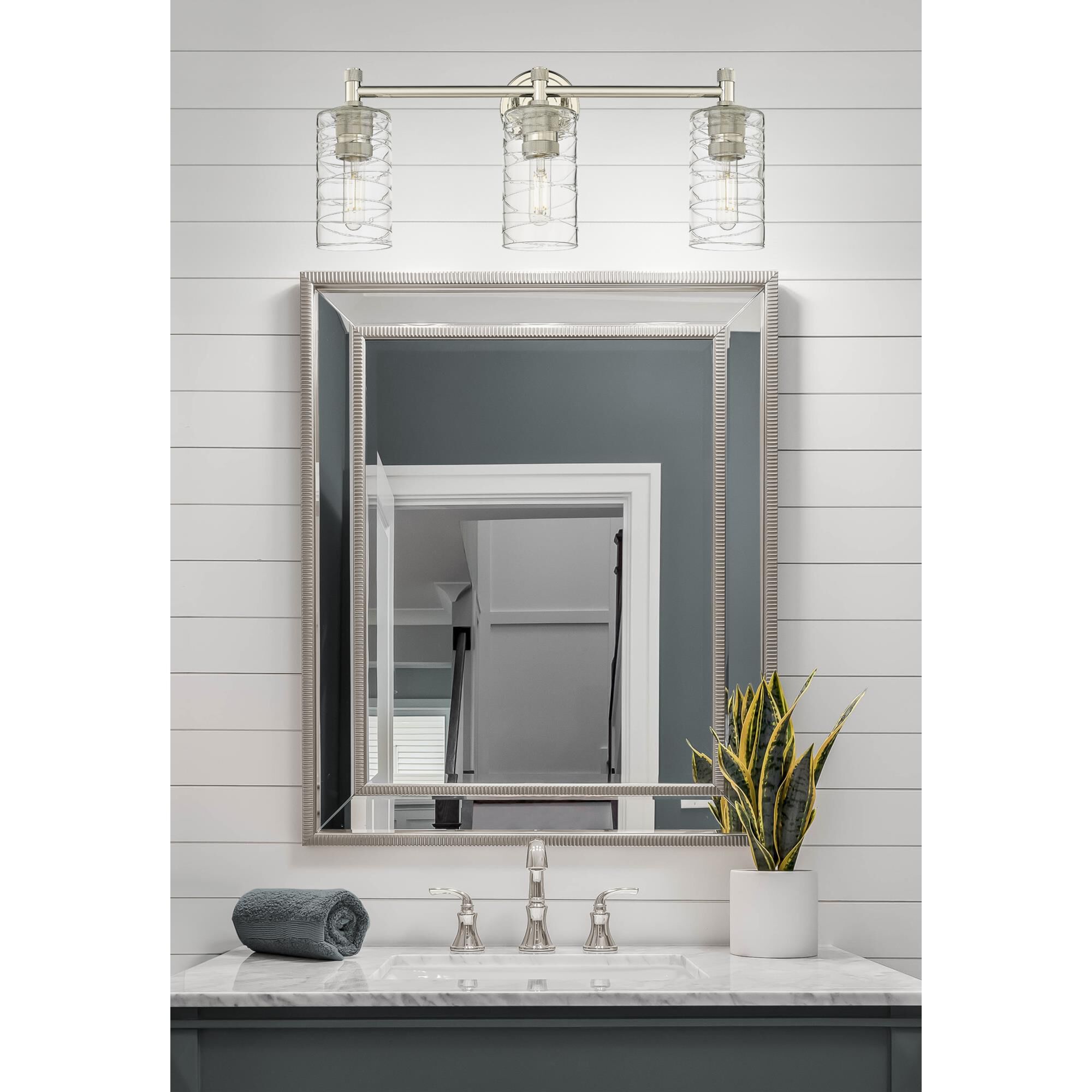 Shown in Polished Nickel finish and Deco Swirl glass