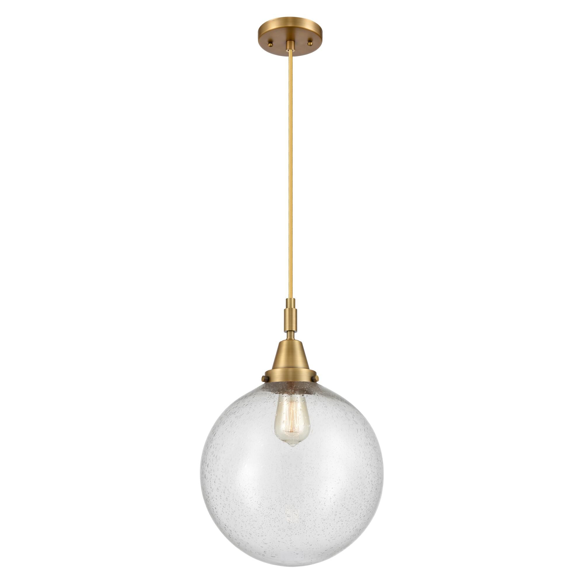 Shown in Brushed Brass finish and Seedy glass