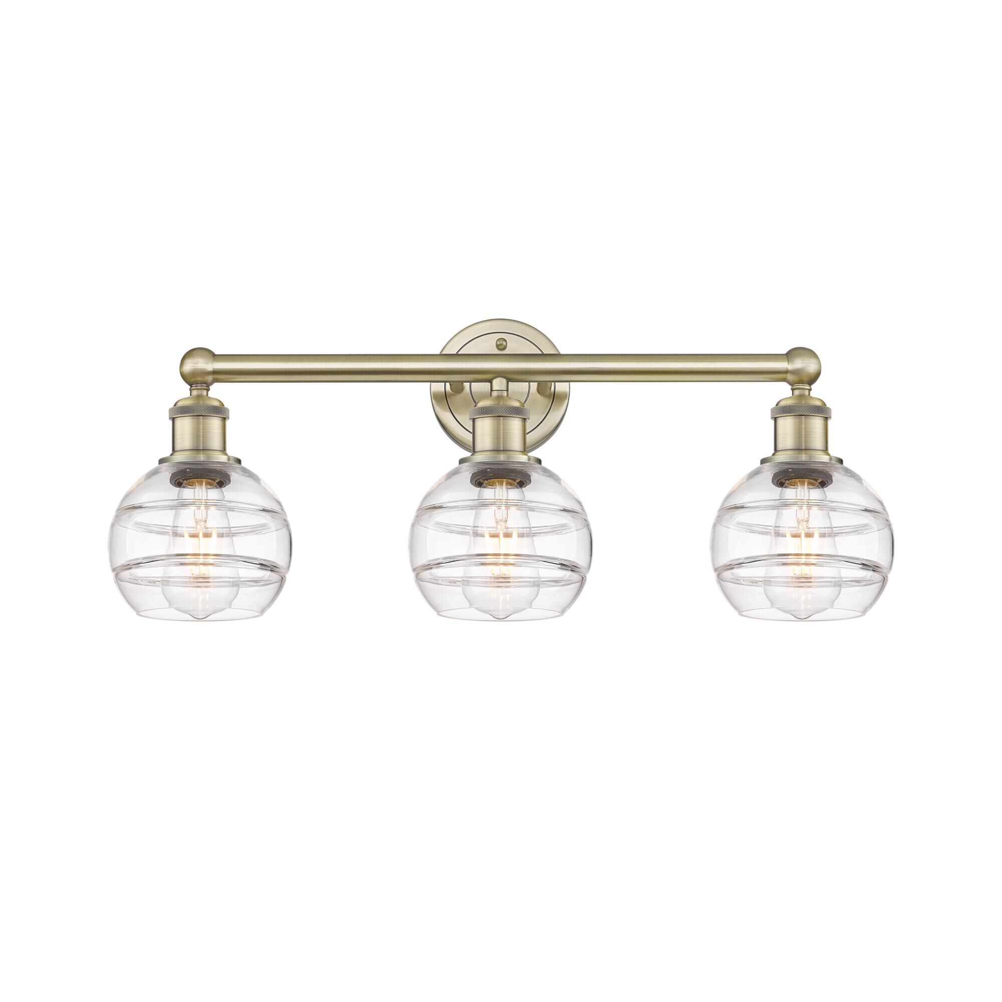 Shown in Antique Brass finish and Clear glass