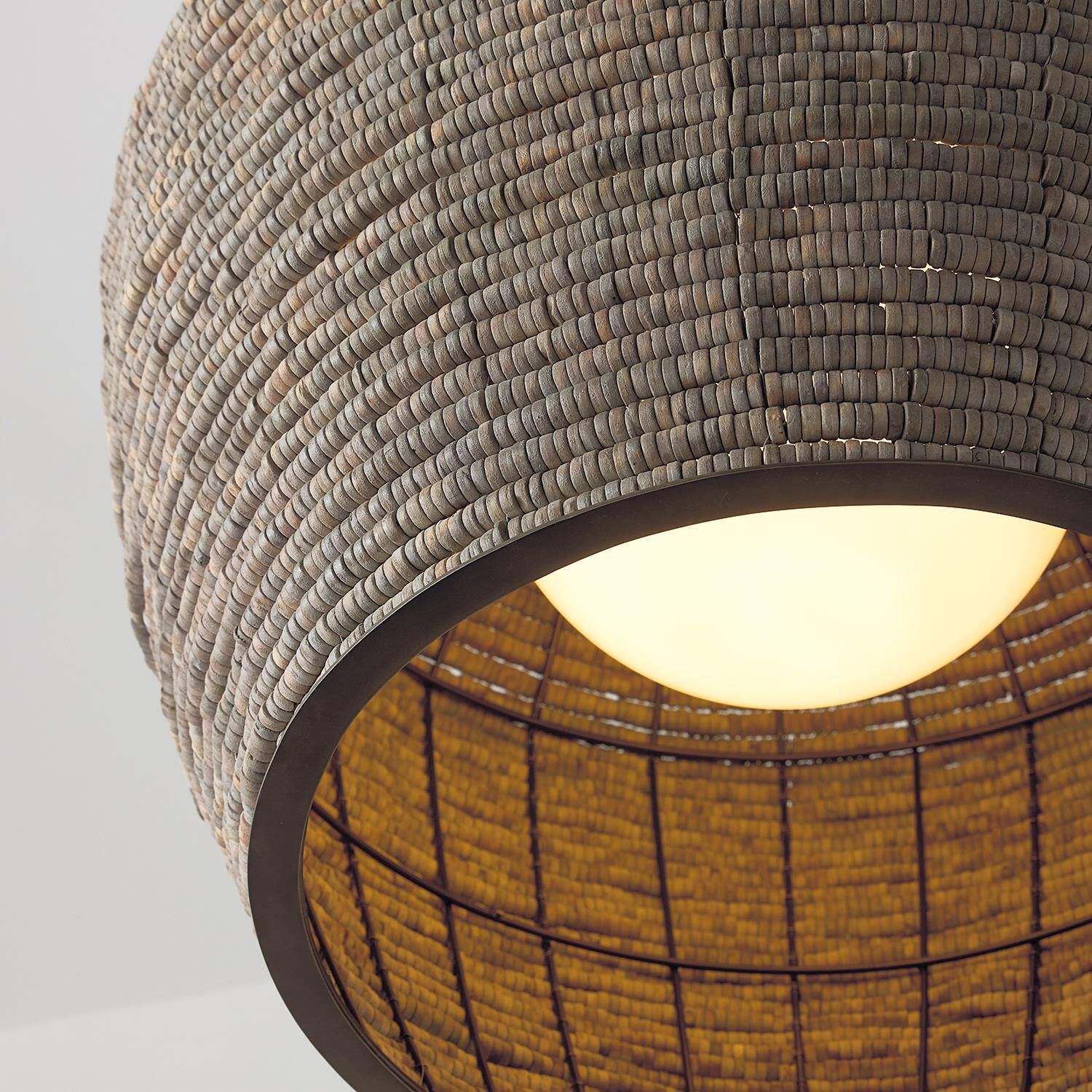 Shown in Aegean Grey And Dark Brass finish and White  Globe glass