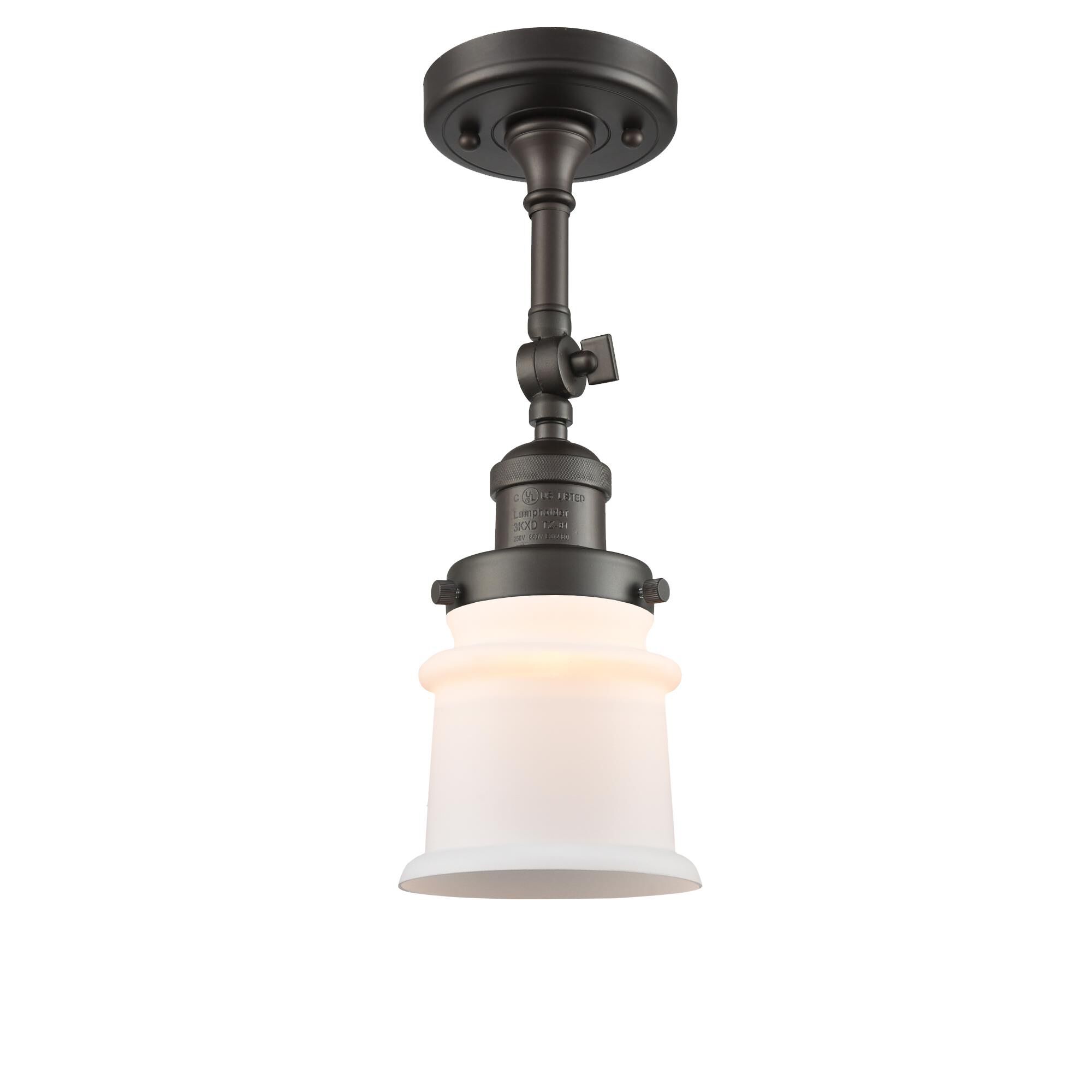 Shown in Oil Rubbed Bronze finish and Frosted glass and None accent