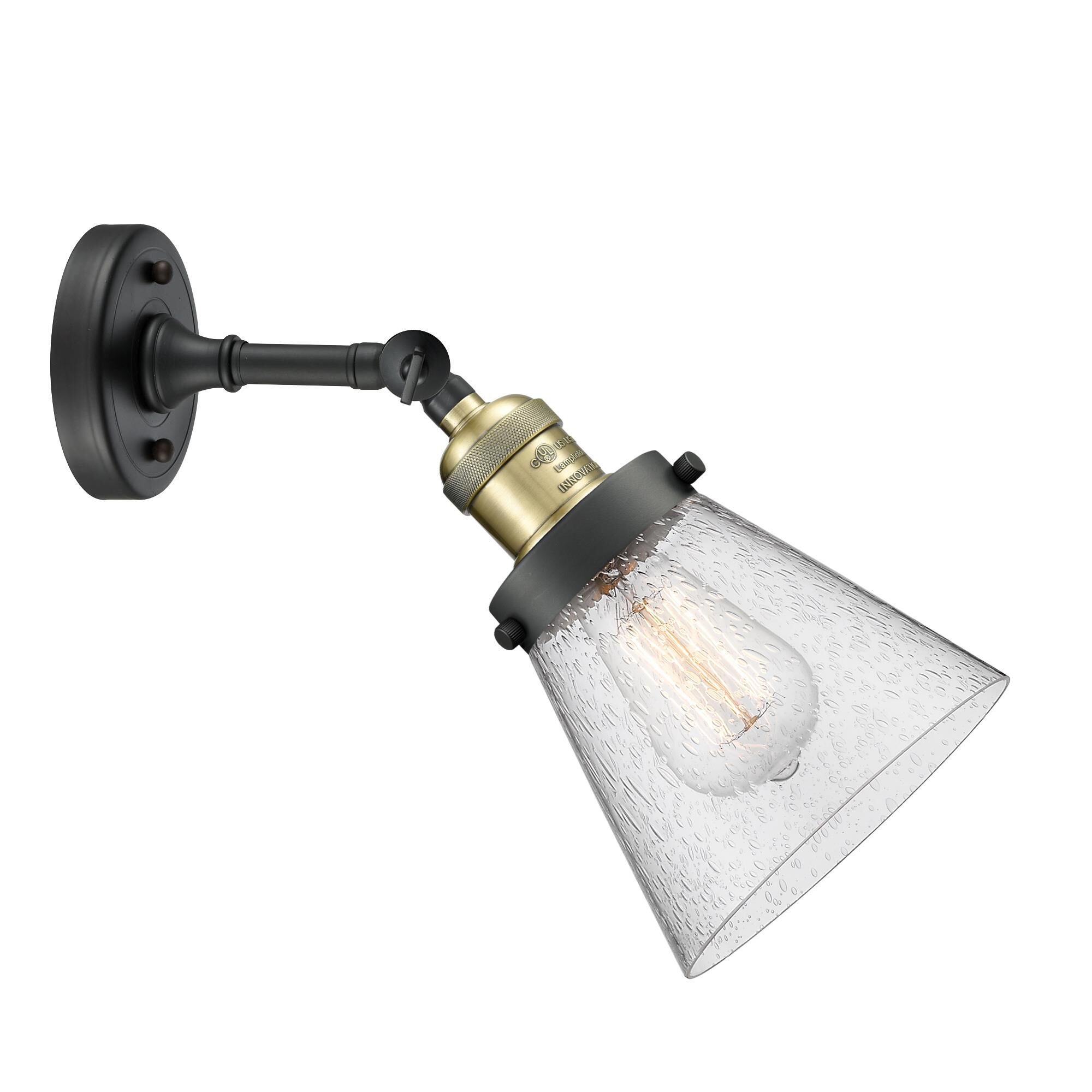 Shown in Black Antique Brass finish and Seedy glass and None accent