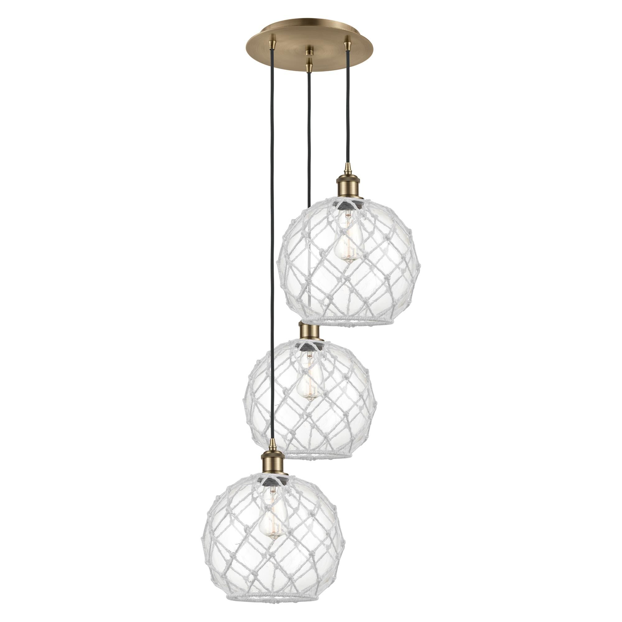 Shown in Antique Brass finish and Clear with White Rope glass