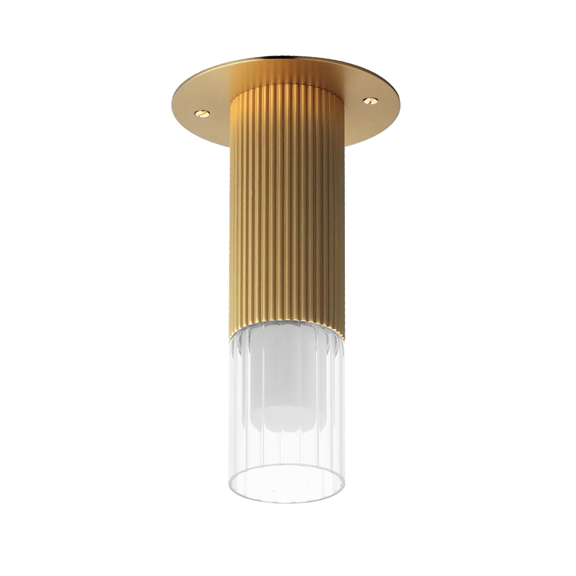 Shown in Gold finish and Clear Ribbed glass