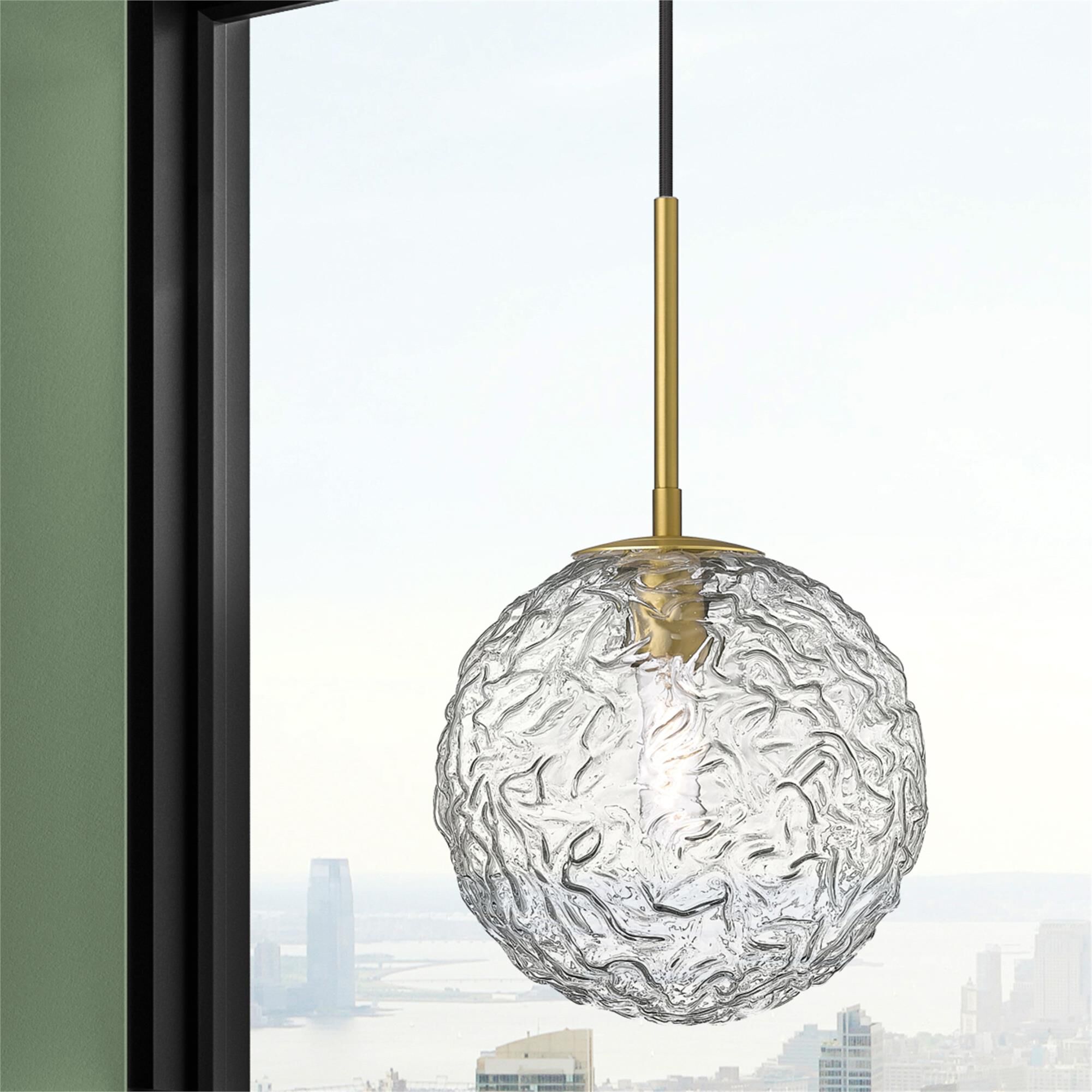Shown in Brushed Brass finish and Clear shade