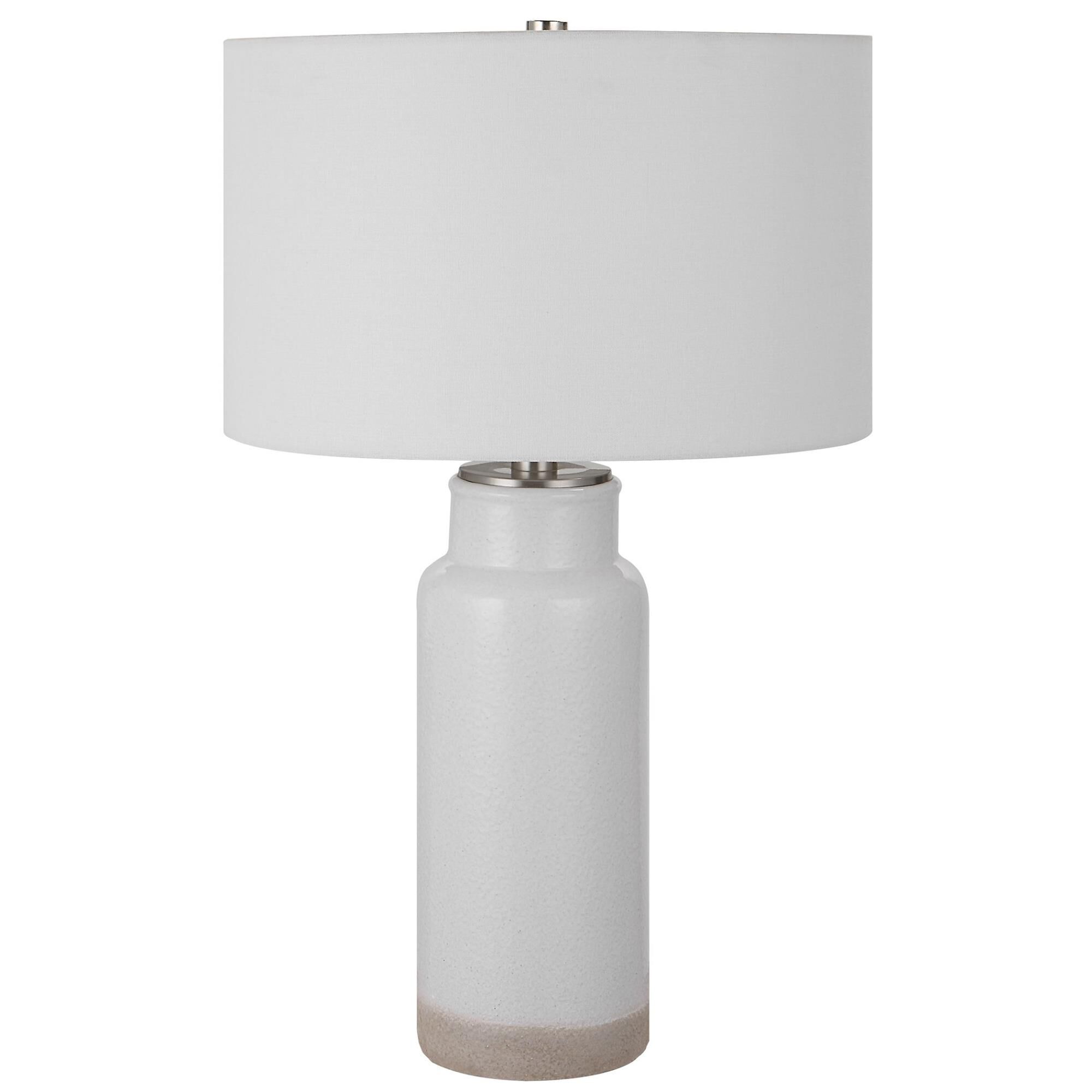 Shown in Inspired By Farmhouse Style Pottery, This Table Lamp Is Handcrafted From Ceramic Finished In A Textu finish and Round Hardback Drum shade