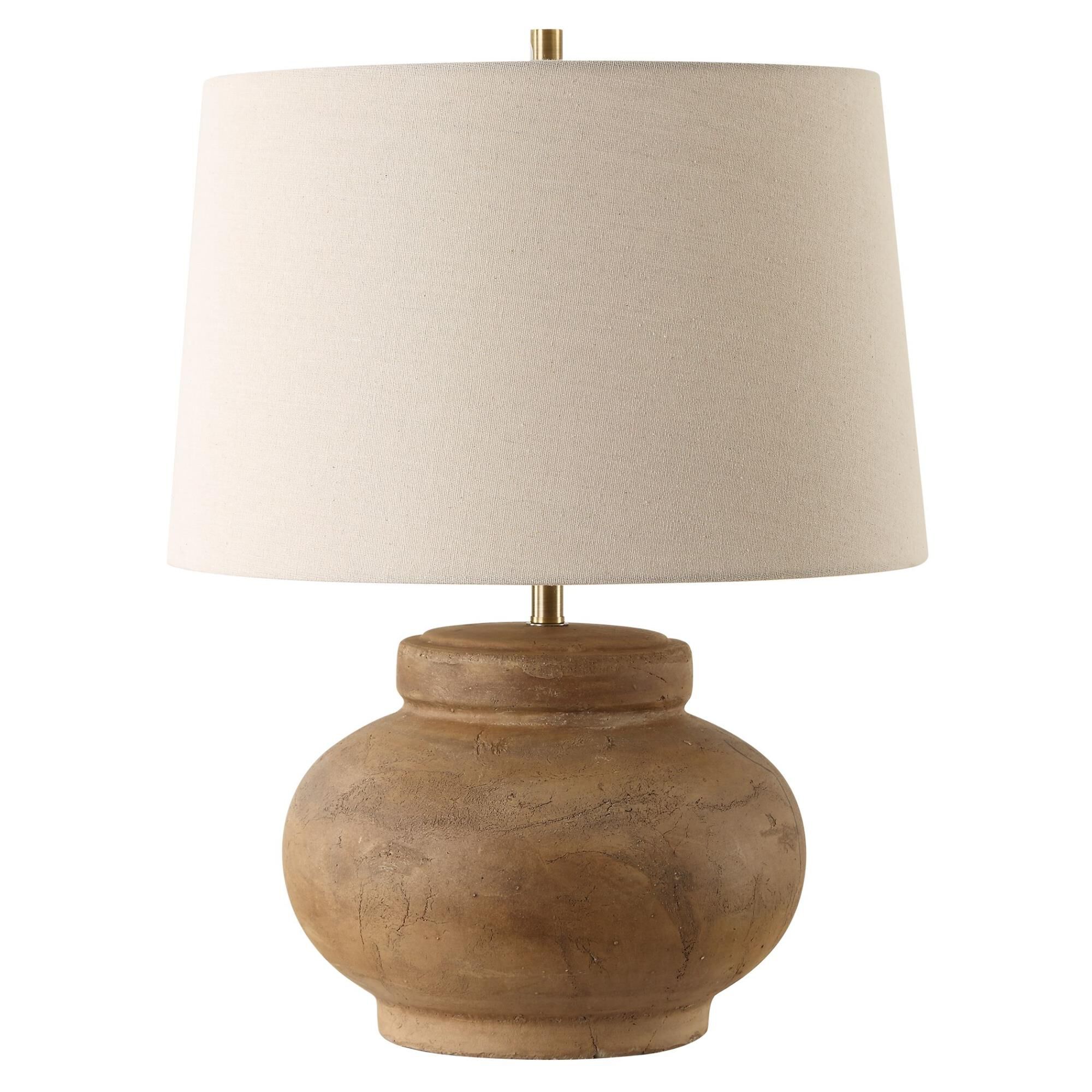 Shown in Crafted With A Distressed Terracotta Base, The Urbino Table Lamp Exudes Warmth And Character With It finish and Round Hardback  Rolled Edge shade