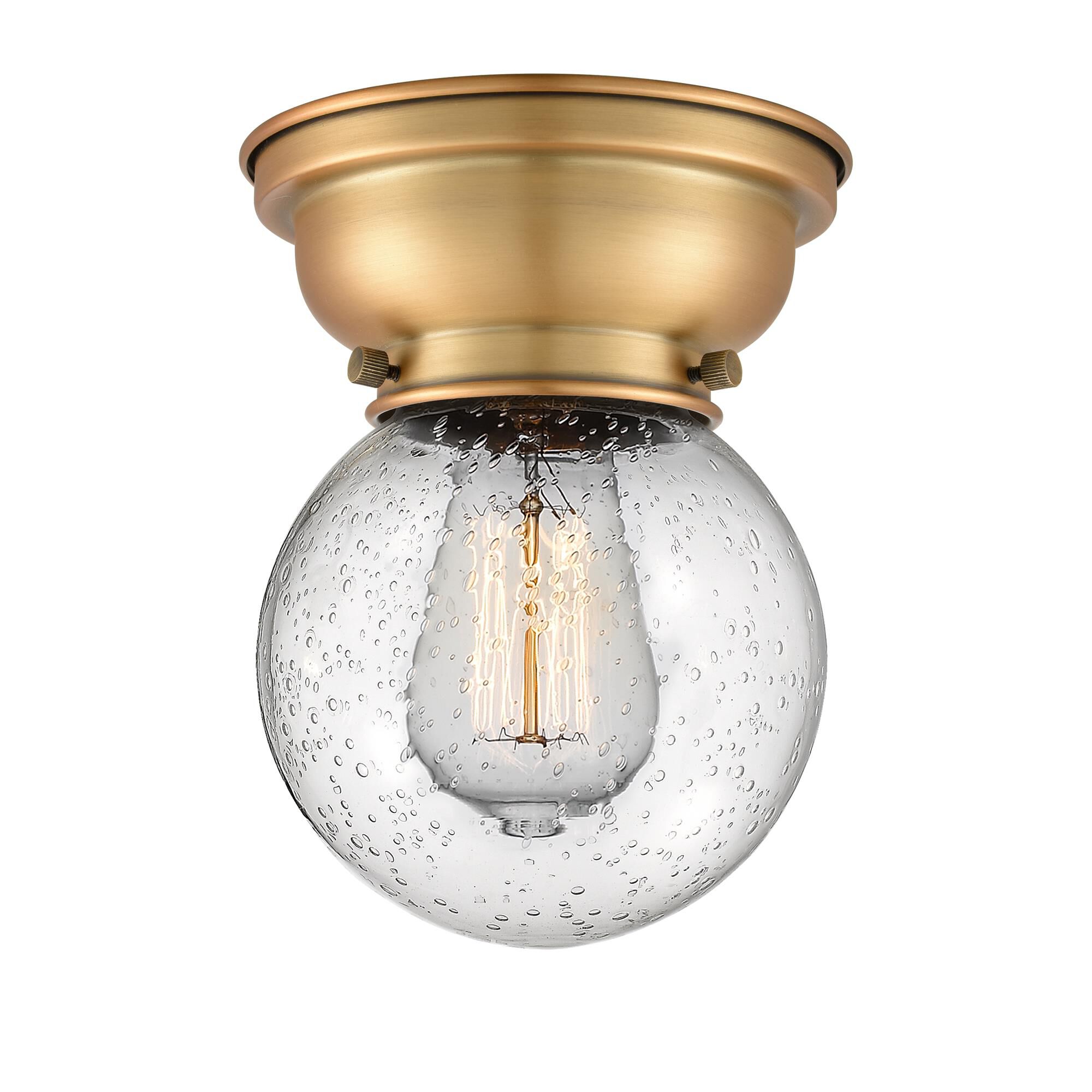 Shown in Brushed Brass finish and Seedy Beacon glass