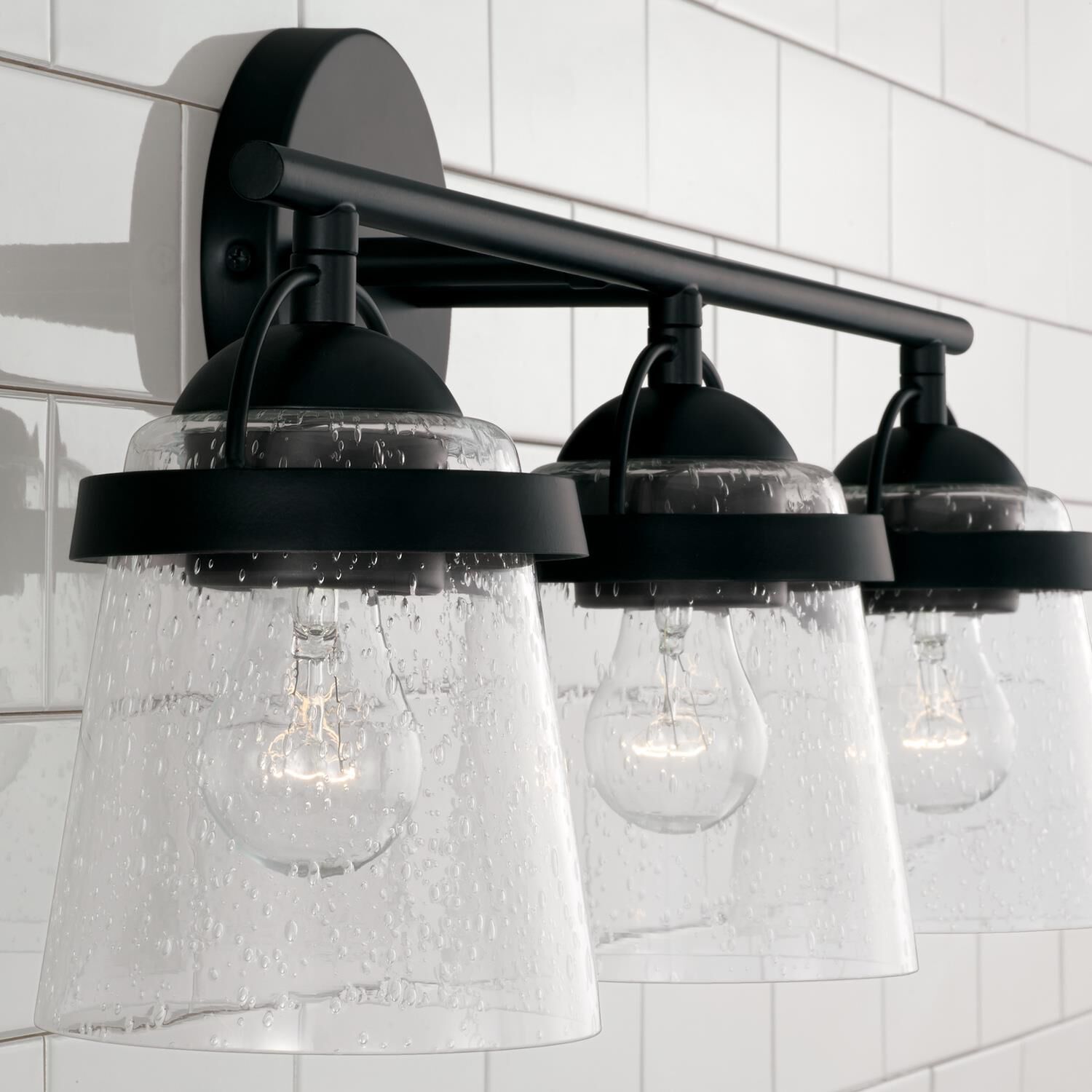 Shown in Matte Black finish and Clear Seeded glass