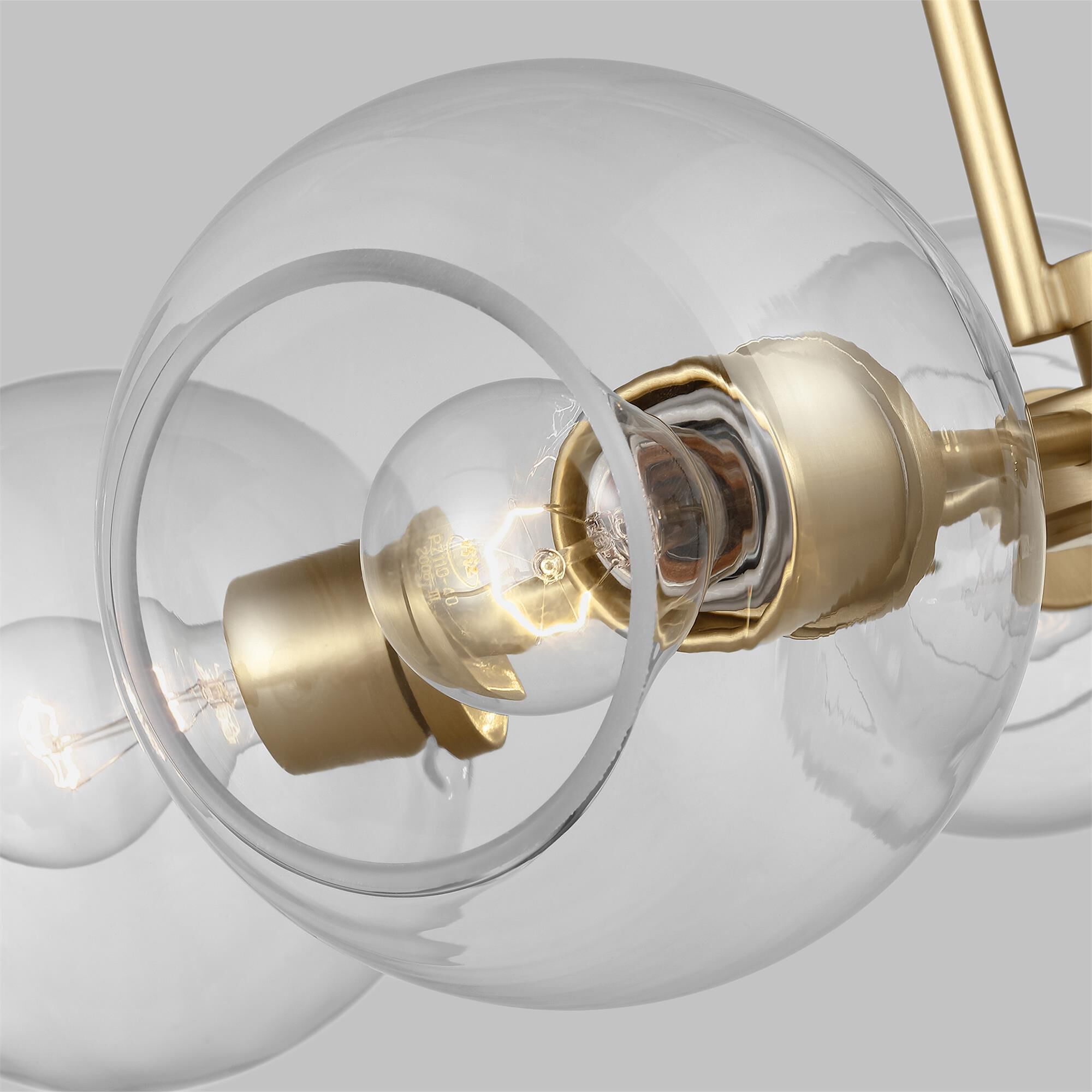 Shown in Satin Brass finish and Clear glass and Clear Glass s shade