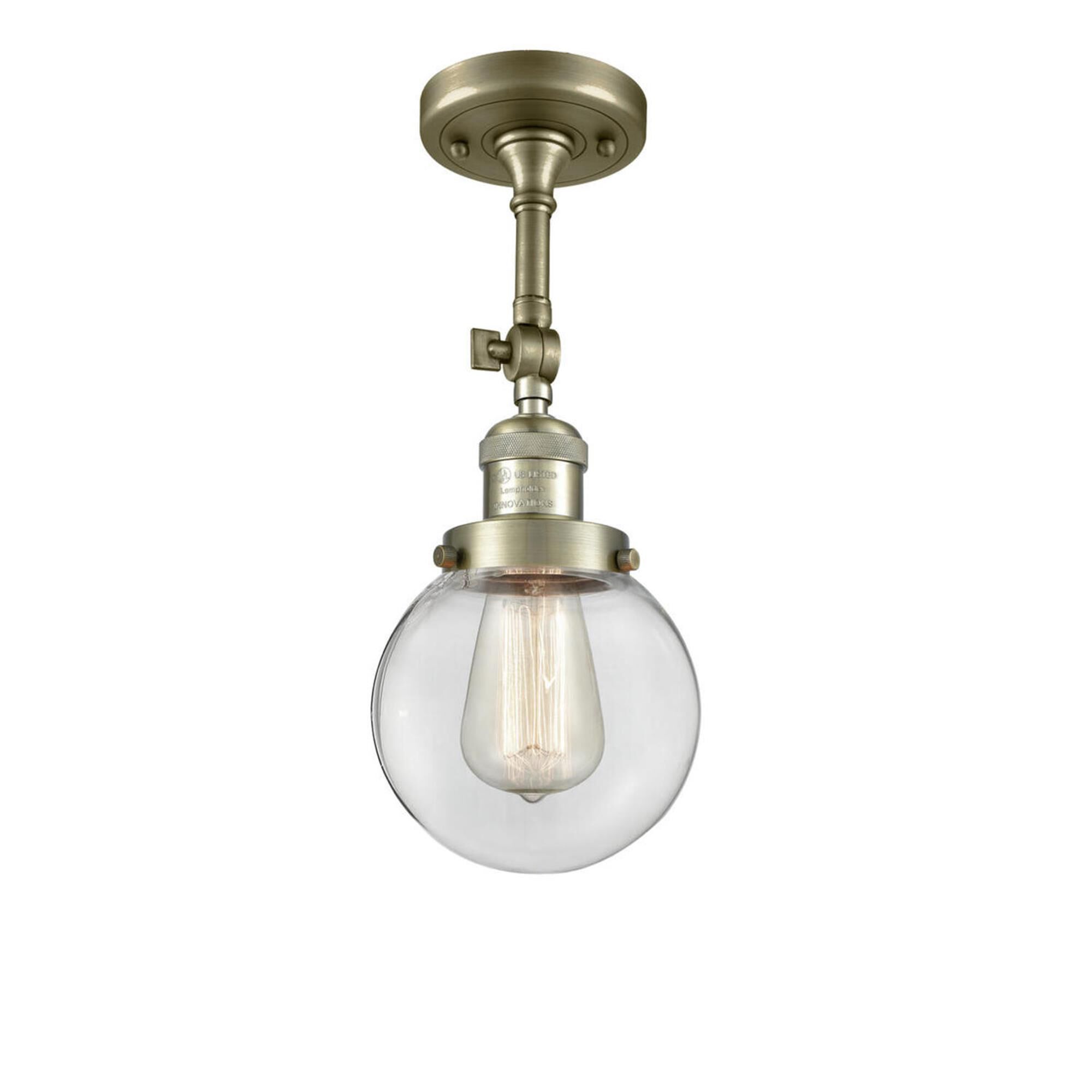 Shown in Antique Brass finish and Clear glass and No Accent accent