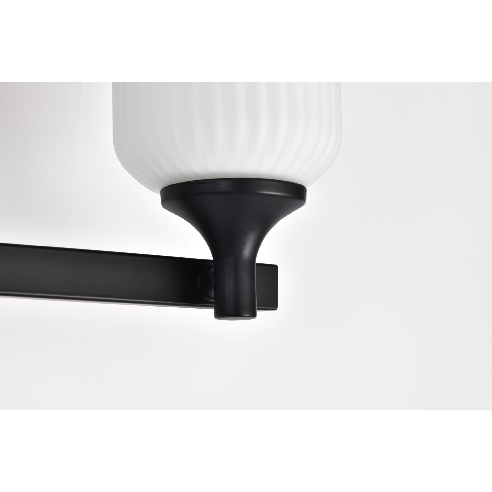 Shown in Matte Black finish and Frosted Ribbed glass