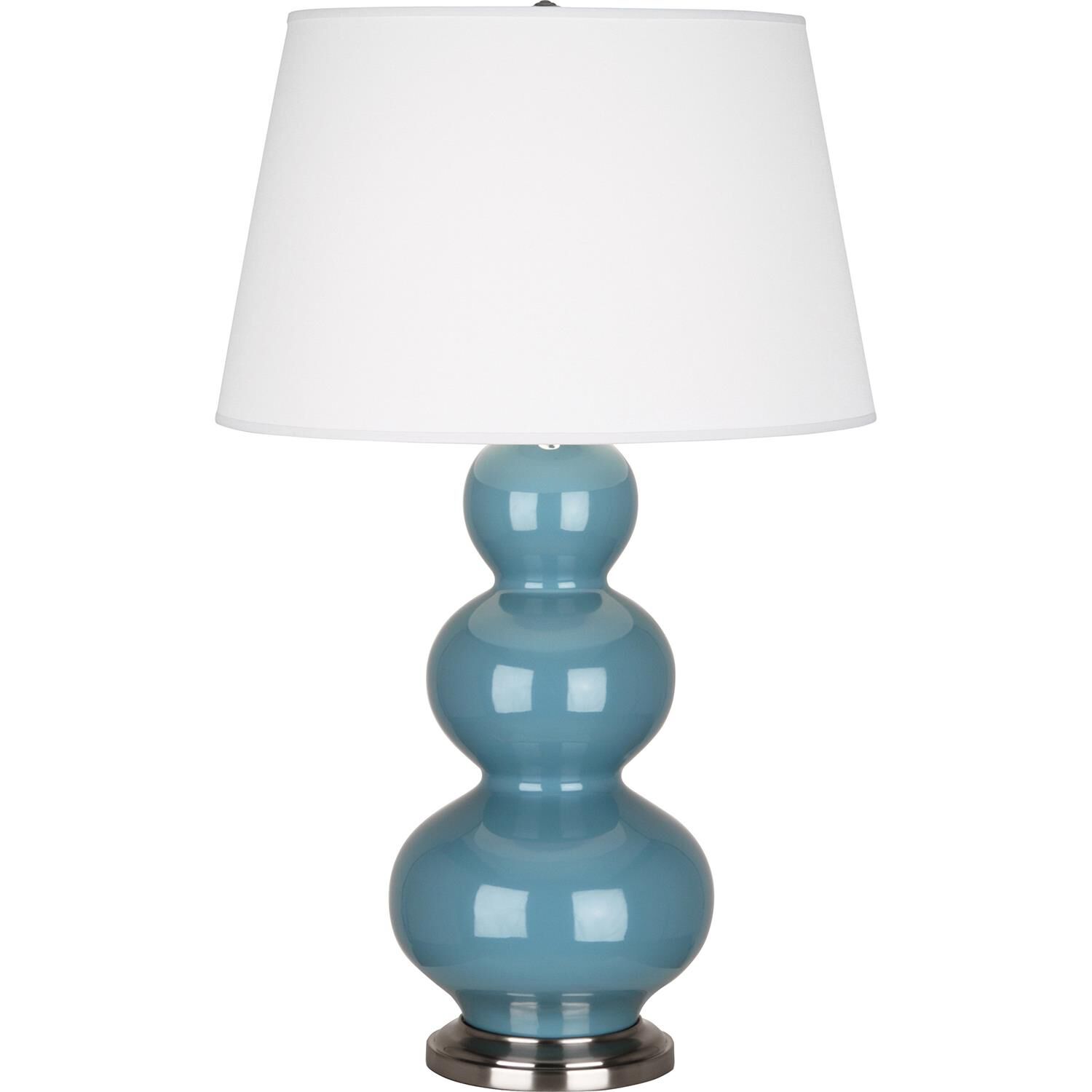 Shown in Steel Blue Glazed Ceramic With Antique Silver ed Accents finish and Pearl Dupioni Fabric shade
