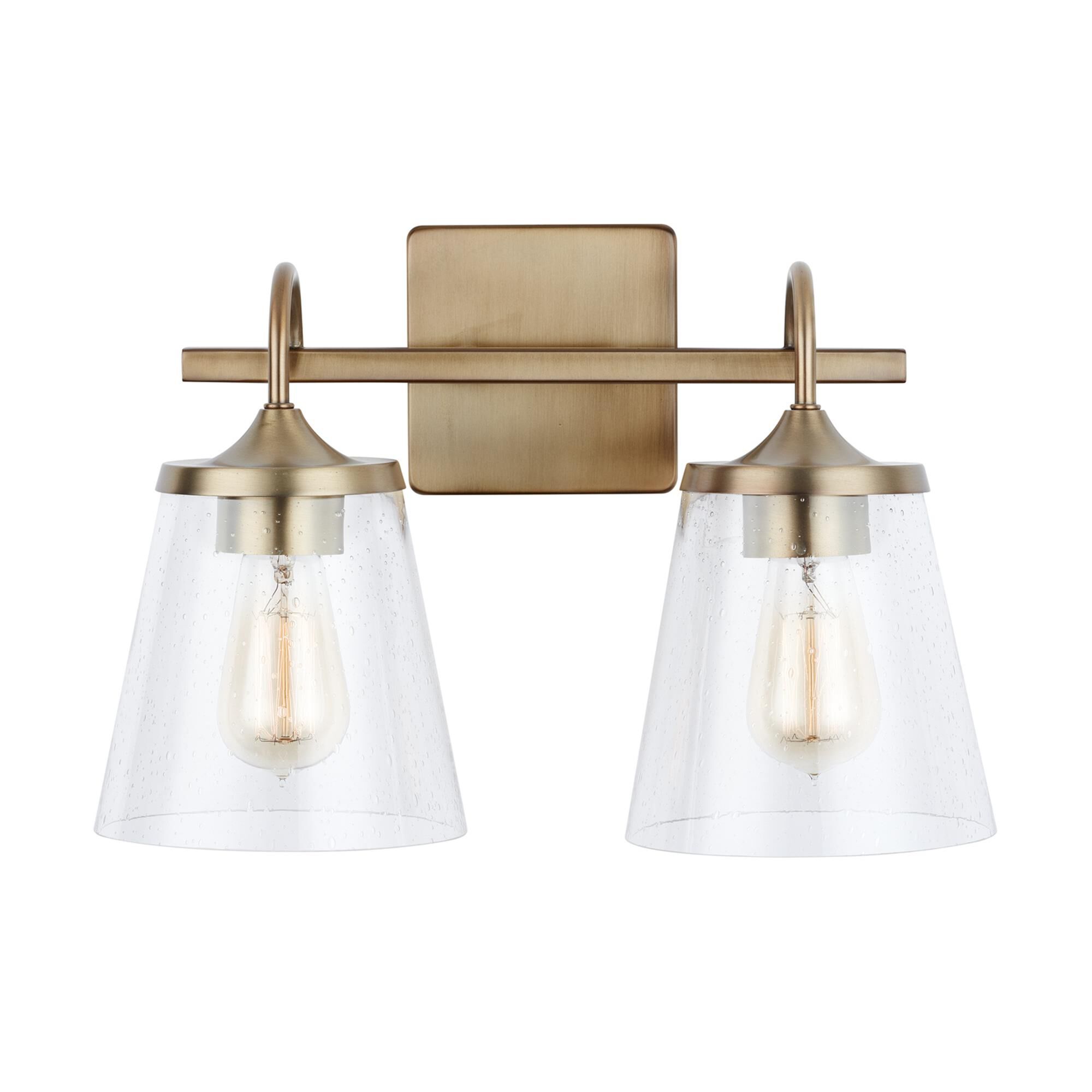 Shown in Aged Brass finish and Clear Seeded glass