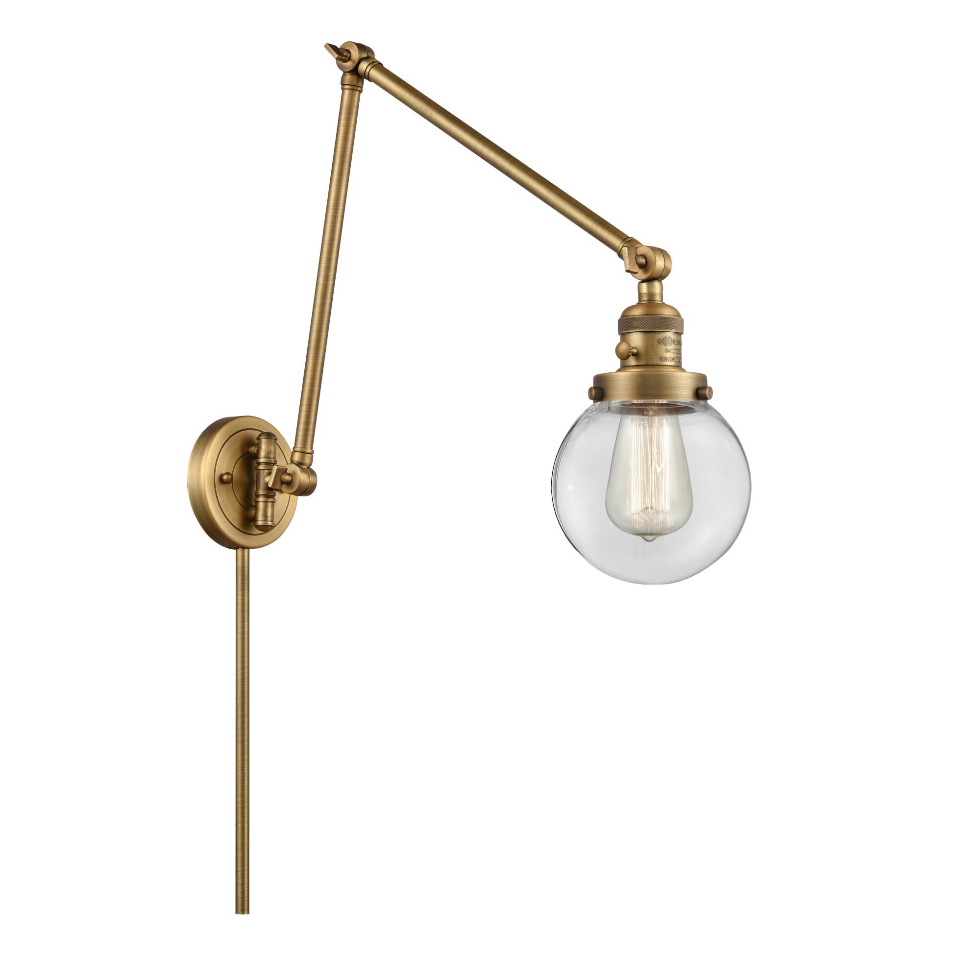 Shown in Brushed Brass finish and Clear Beacon glass